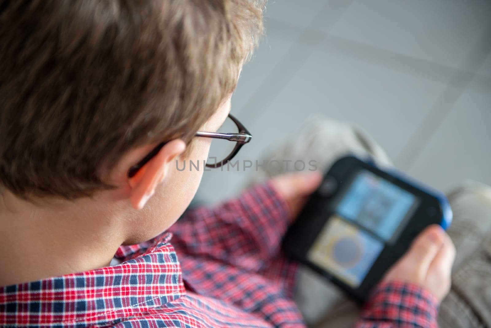 a child boy playing video game