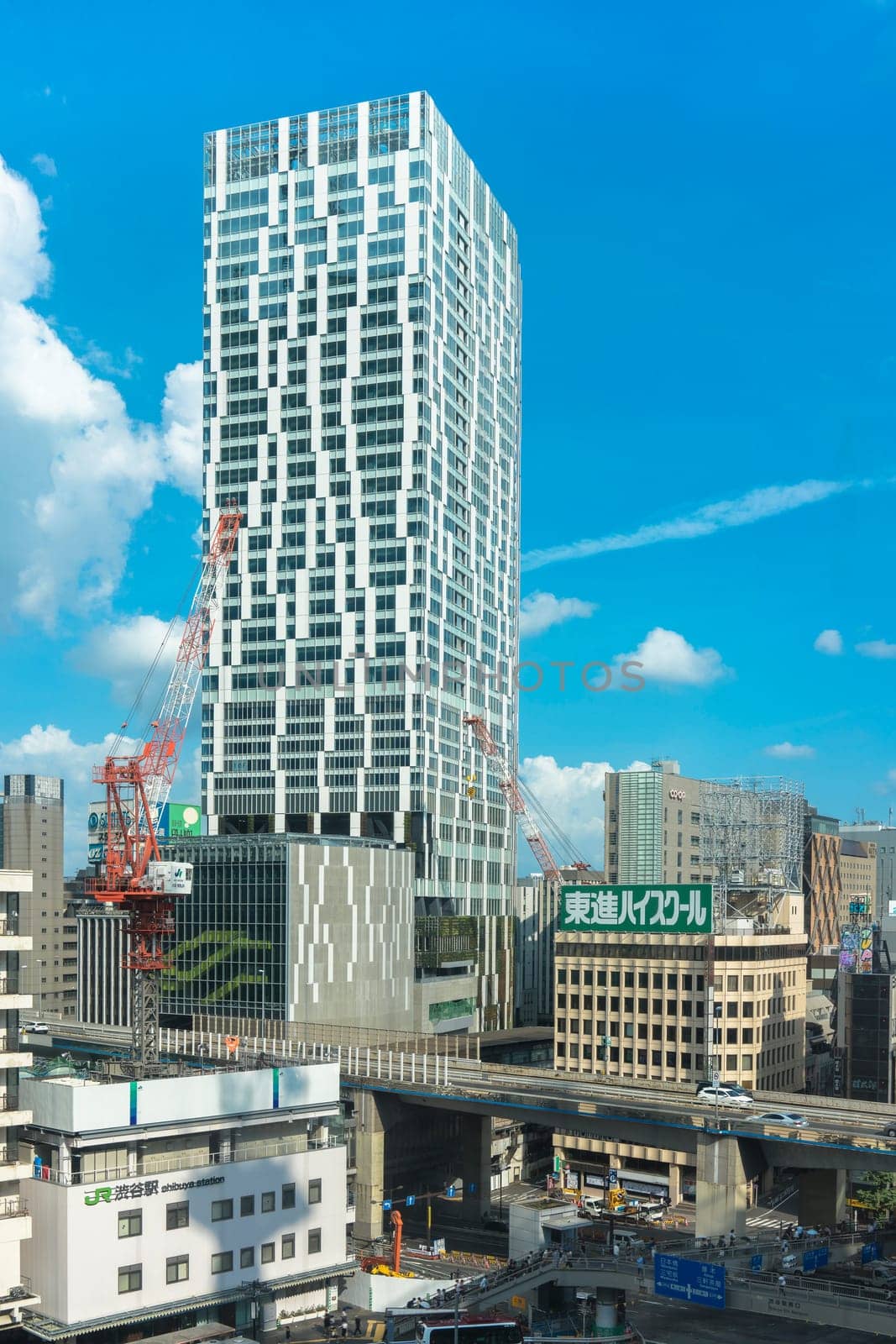 View of the southern exit of Shibuya Station, famous for its moai statue, with Shibuya Stream in the background, a new 180-meter building with offices, a hotel and a shopping gallery of thirty shops that will open their doors September 13, 2018.