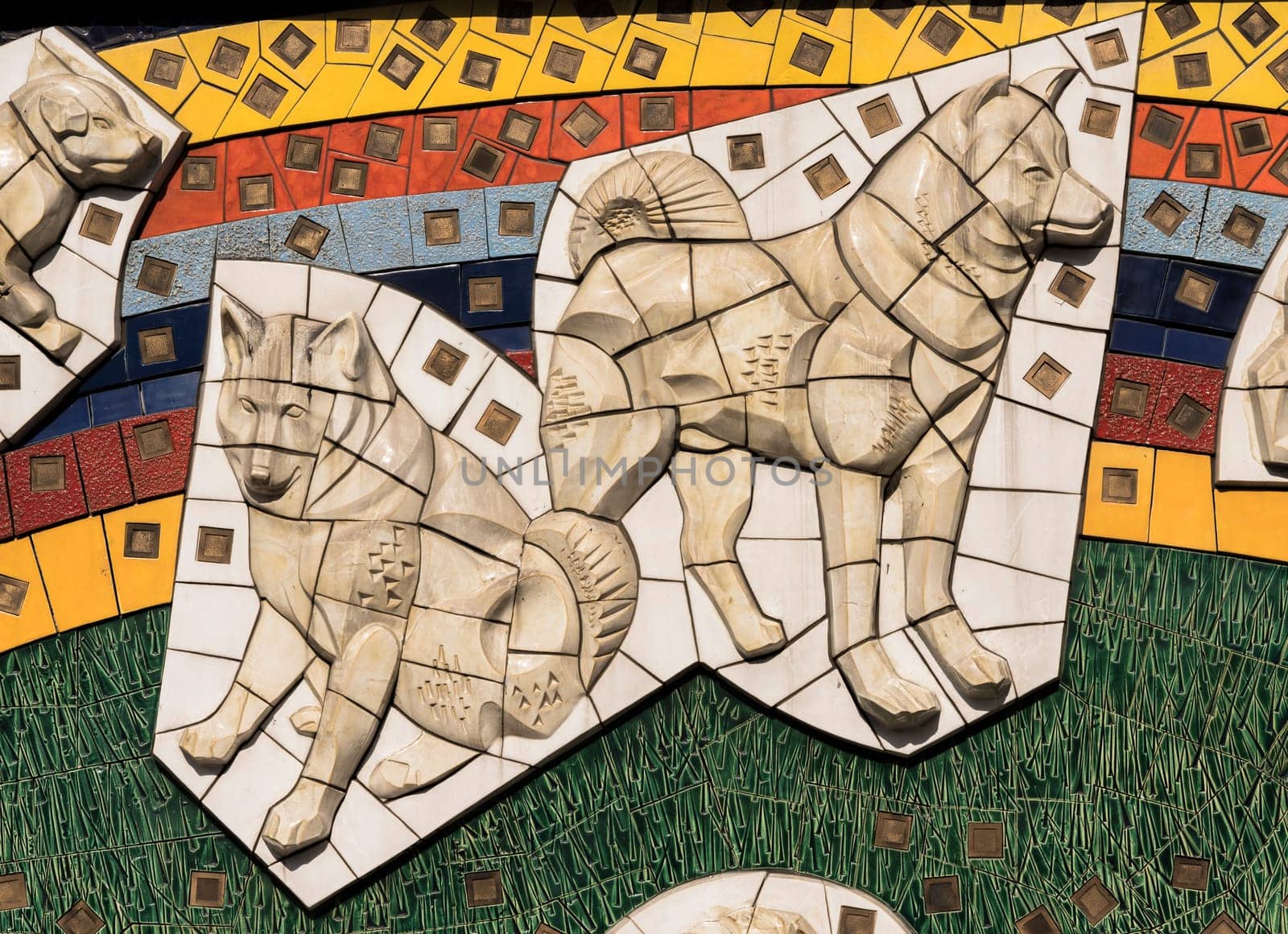 Large mural of the Shibuya station representing the dog Hachiko surrounded by twenty other akitaken dogs. Its size is 4 meters by 20 meters.