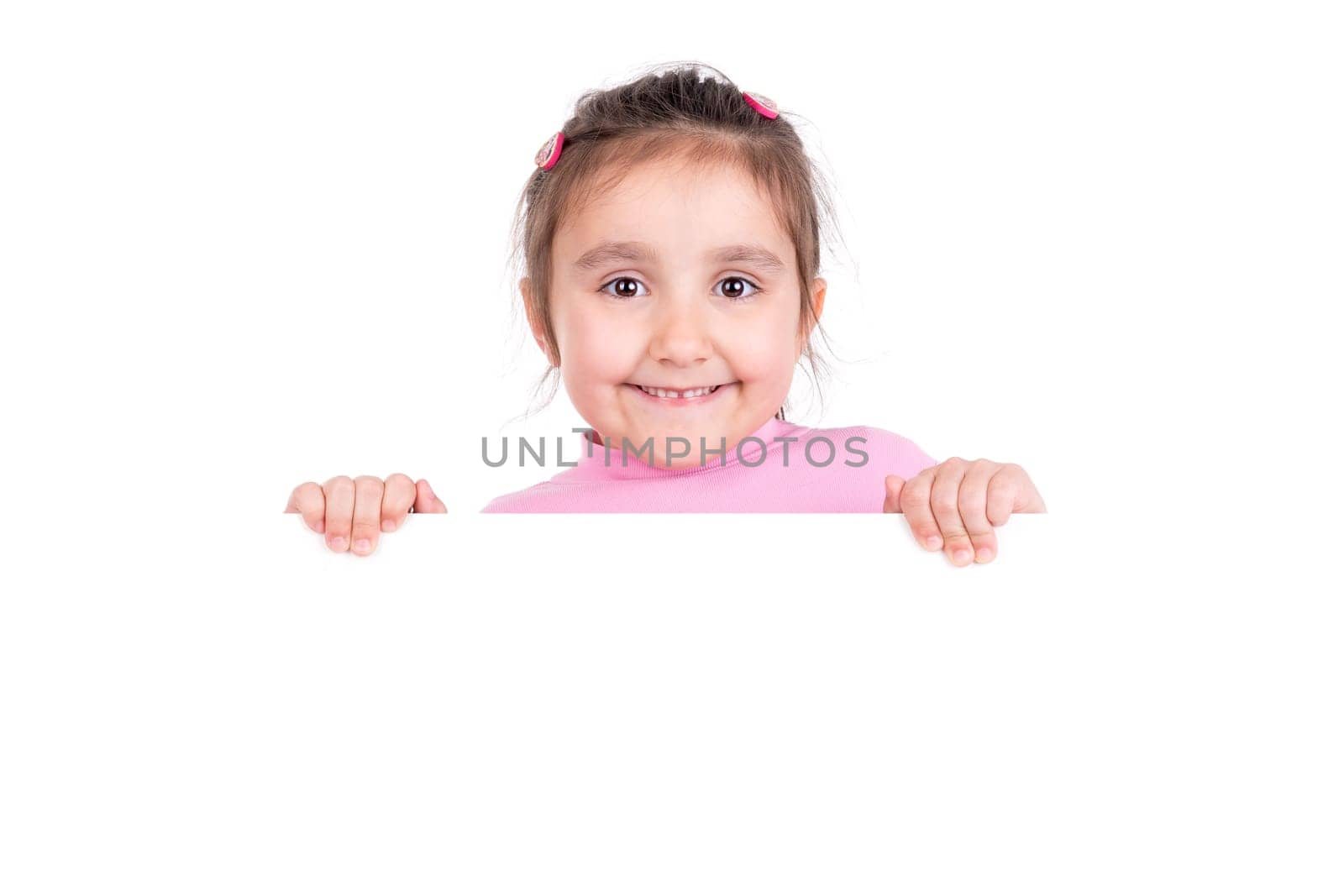 Young girl posing with a white board