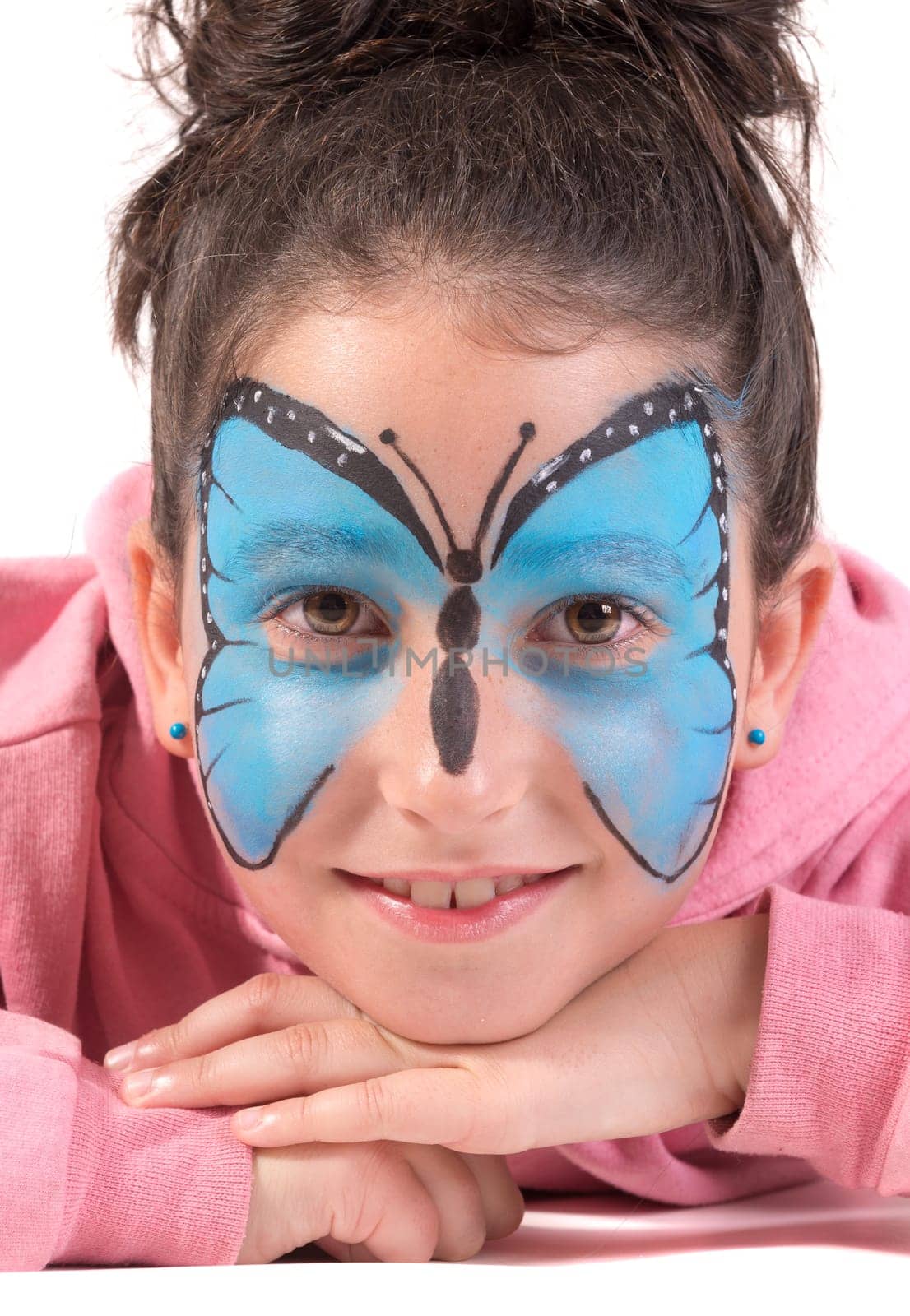 Girl with animal face-paint isolated in white