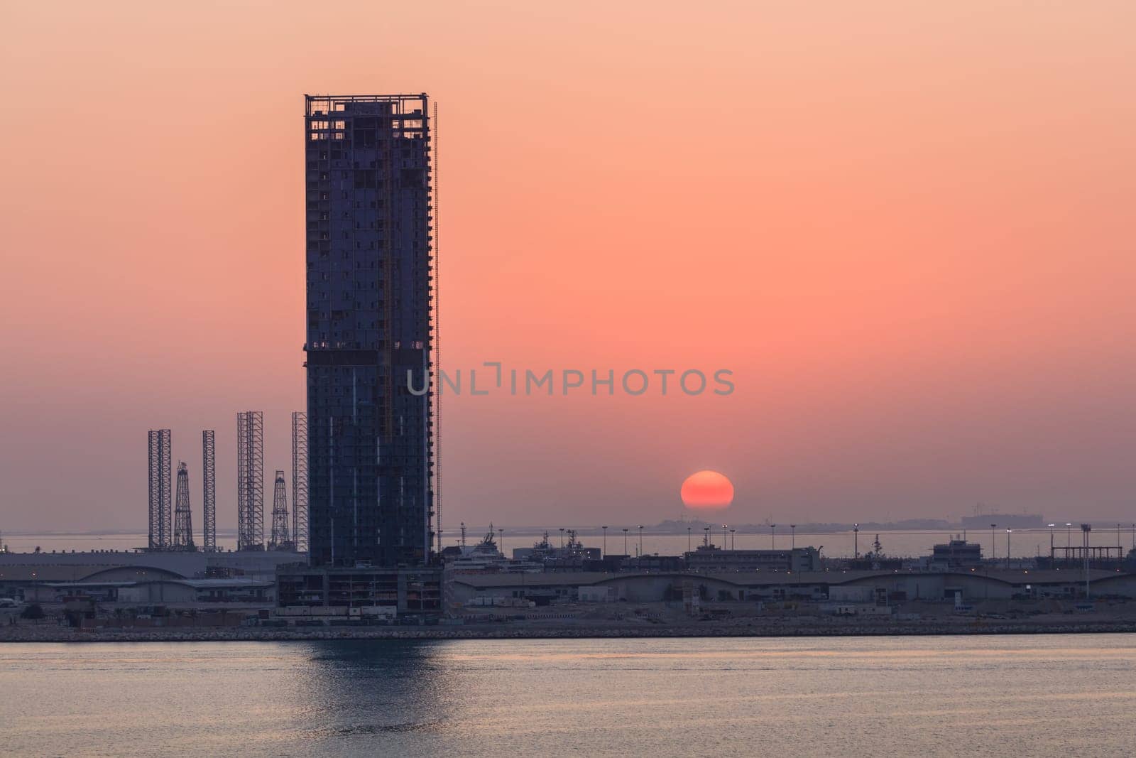 sunset in Dubai seaport. United Arab Emirates