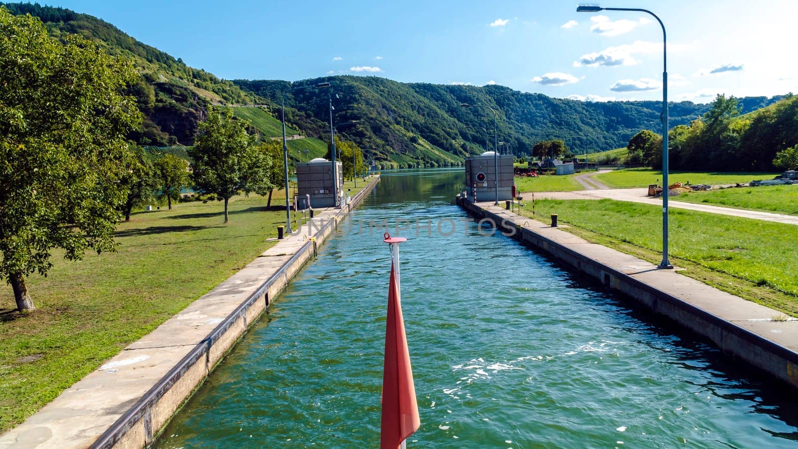 Ship Sluice with vine moutain in summer on River Mosel in Germany