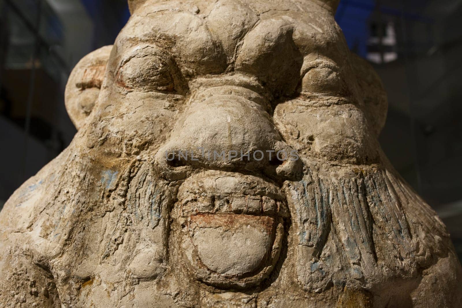 Barcelona, Spain - Dec 27th, 2019: Ancient Egypt God Bes. Face closeup. Museum of Ancient Egypt Culture of Barcelona, Spain