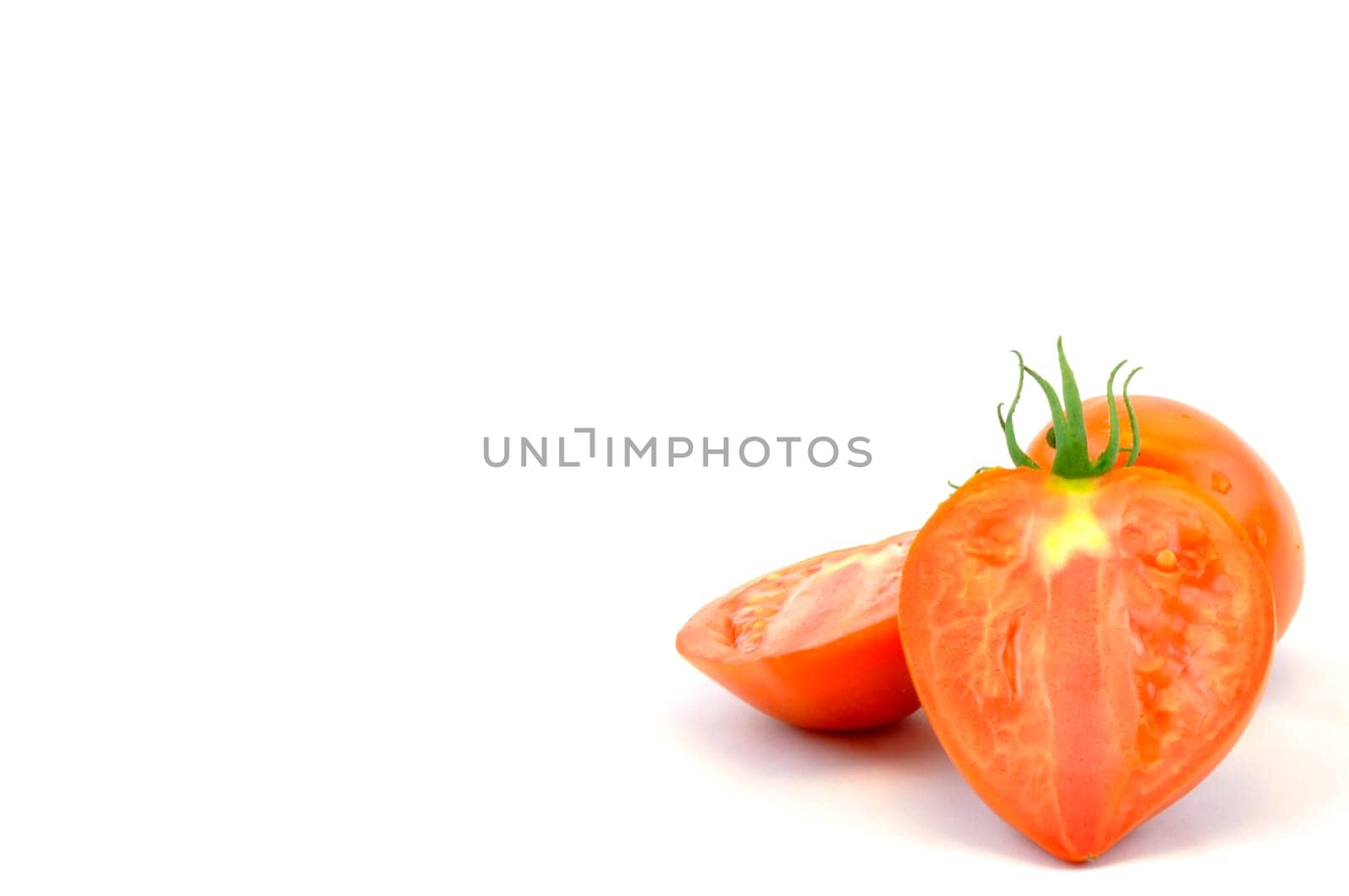 Fresh organic homegrown tomatoes on white background