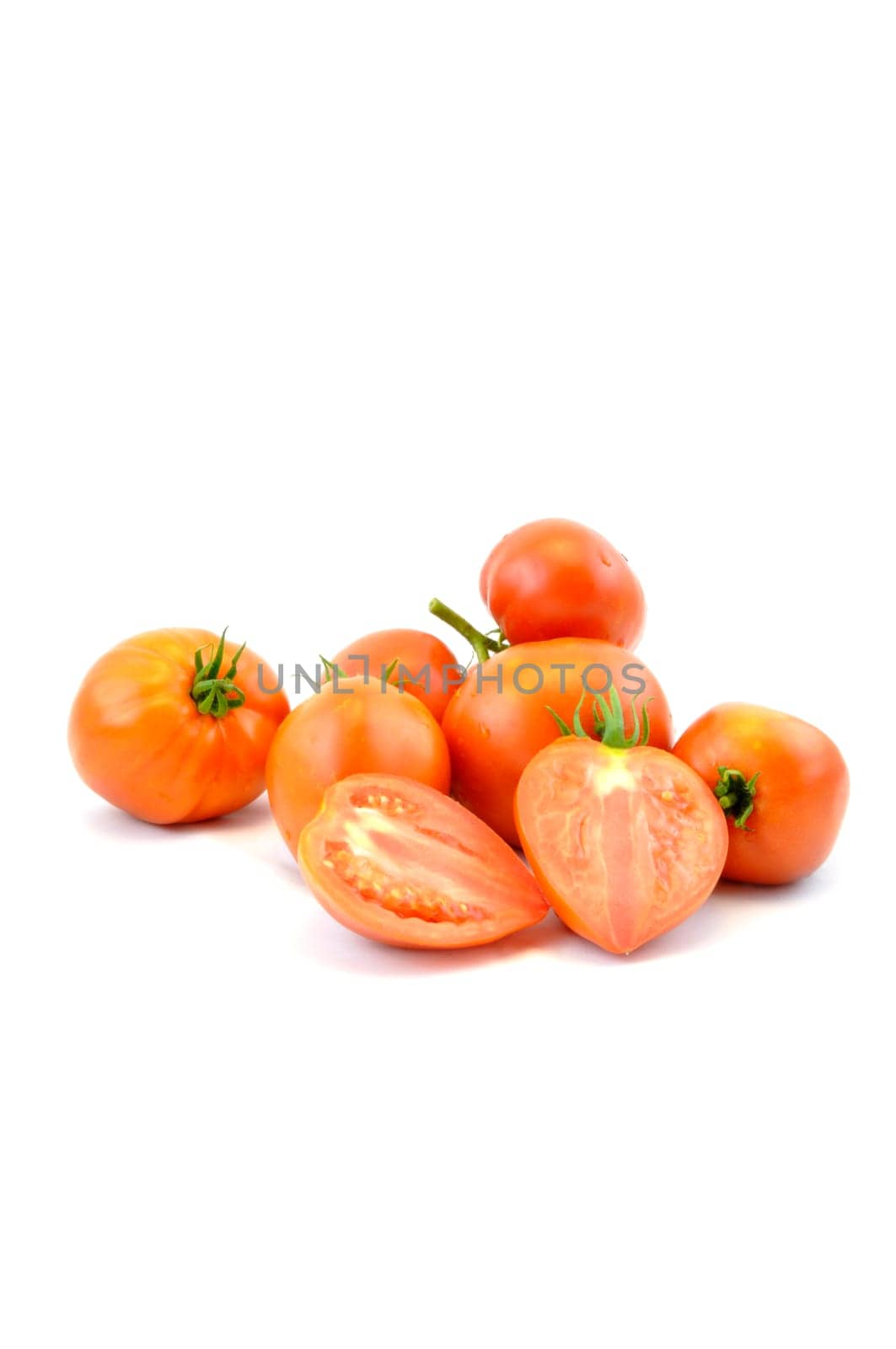 Fresh organic homegrown tomatoes on white background