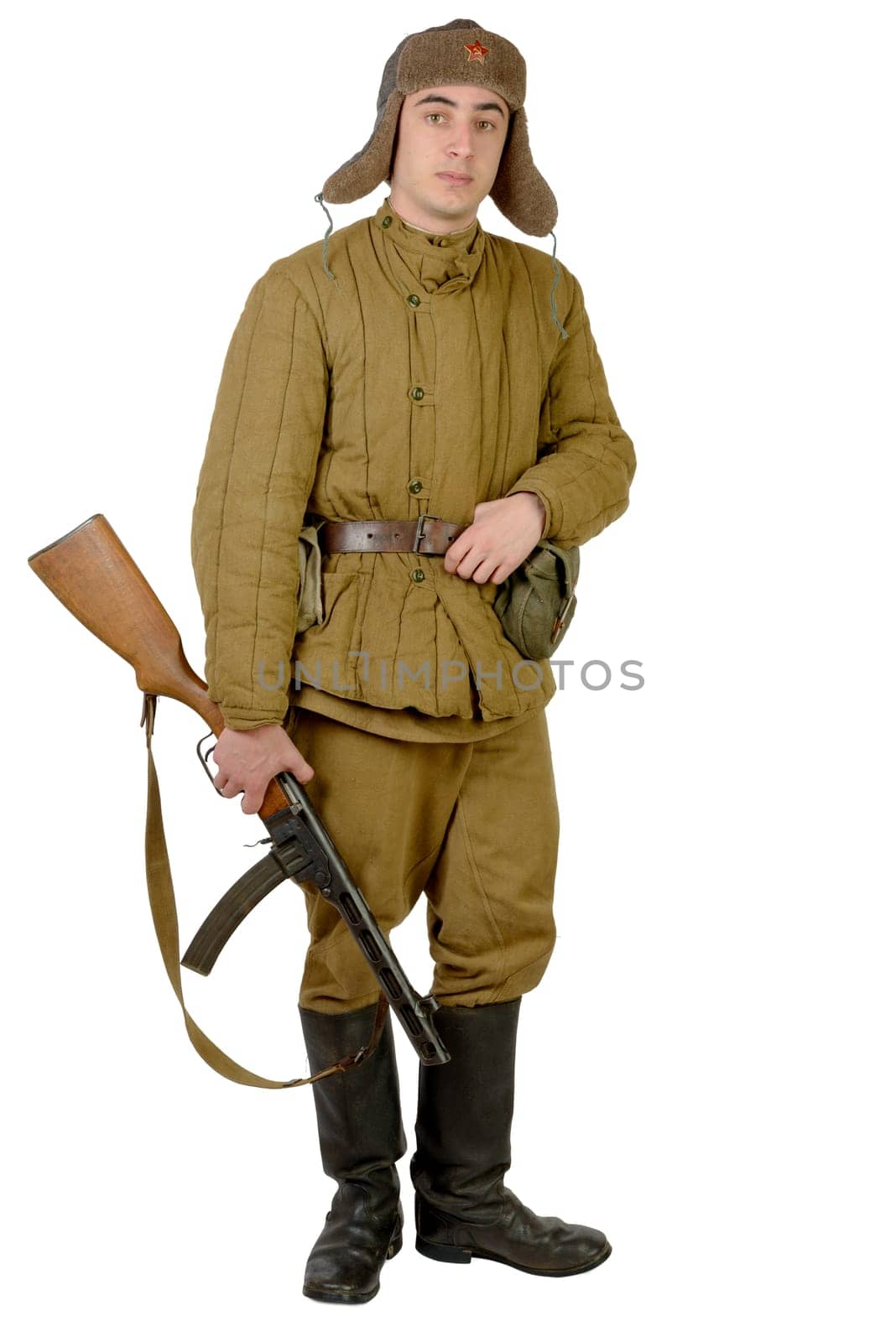 young Soviet soldier with machine gun on the white background