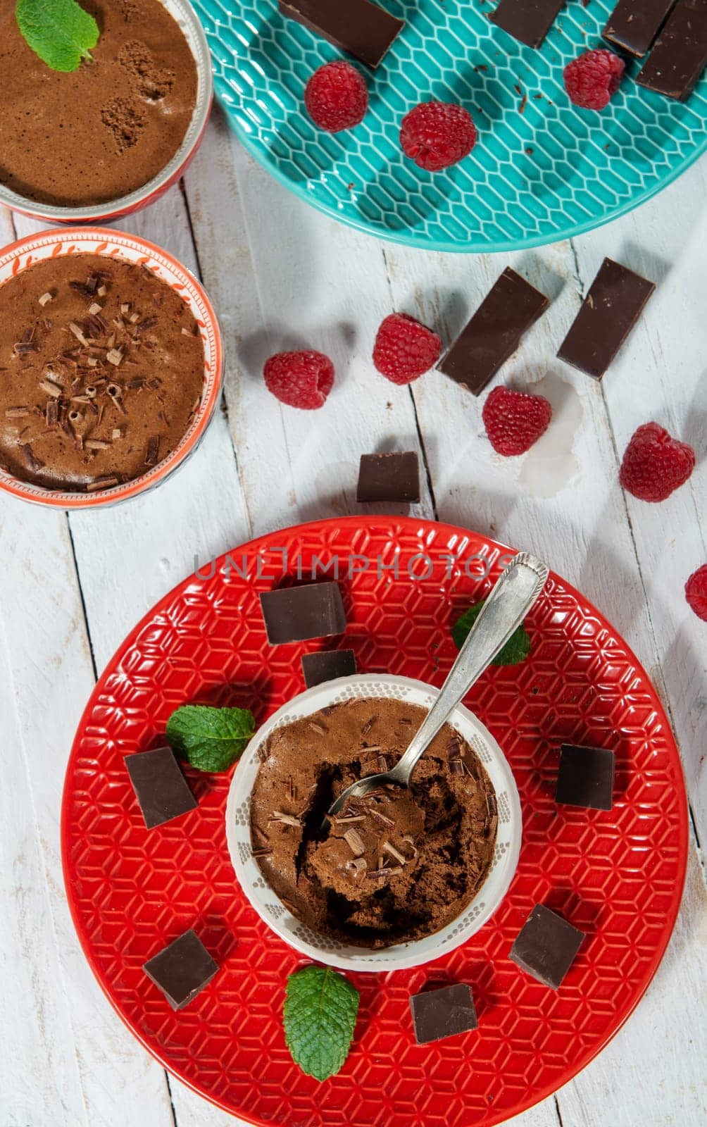 Homemade chocolate mousse with the fresh raspberry