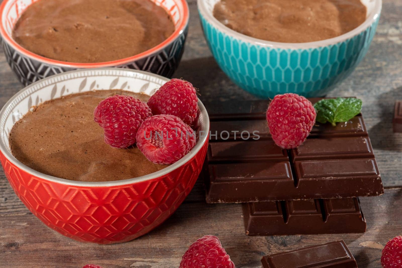 Homemade chocolate mousse with the  fresh raspberry