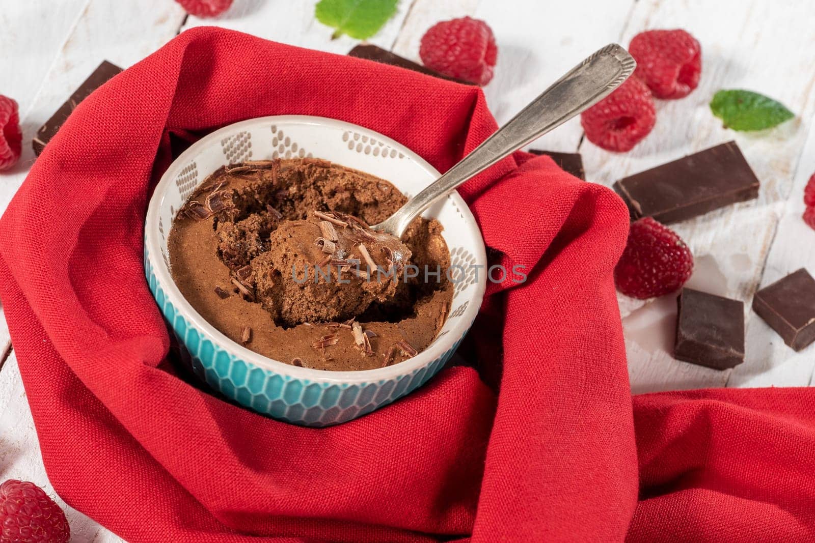 Homemade chocolate mousse with the fresh raspberry