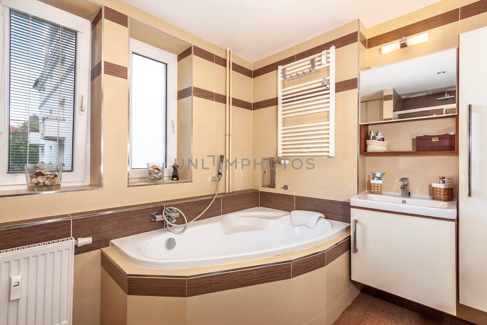 modern bathroom in the apartment. A glass shower door. High quality photo