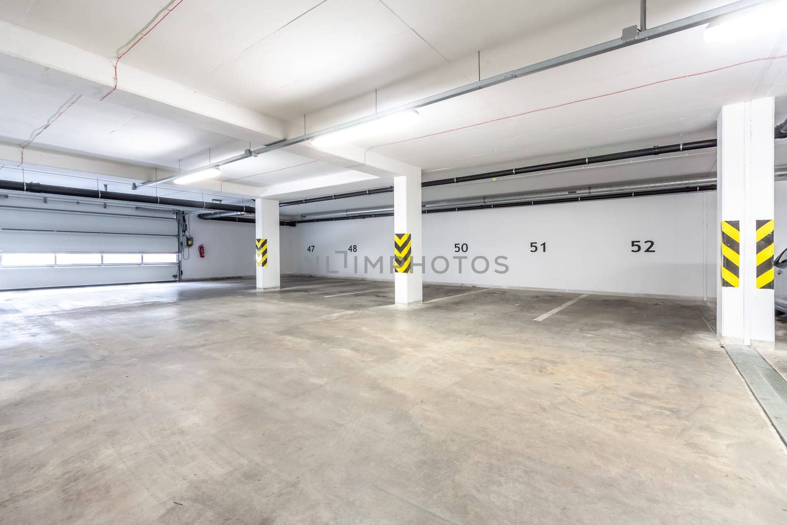 A large empty room - garage parking for cars. High quality photo