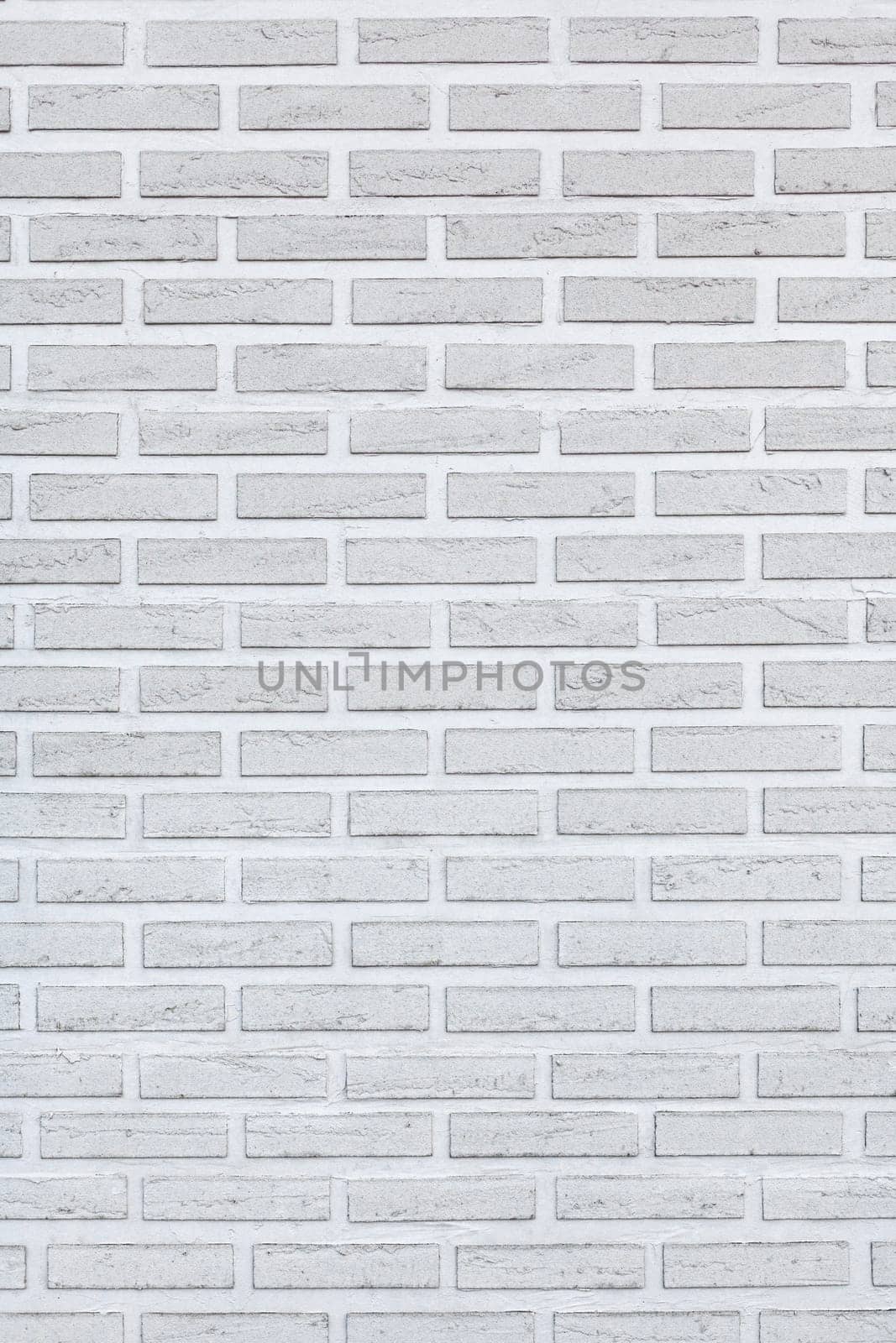 white stone wall as background - photo background