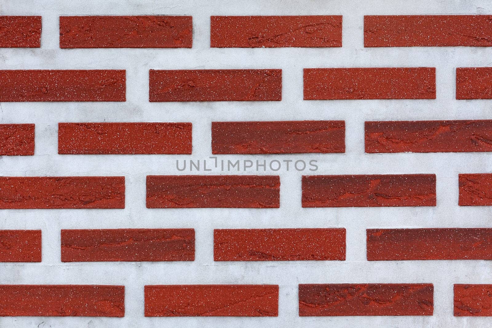 brick red wall as background - photo background
