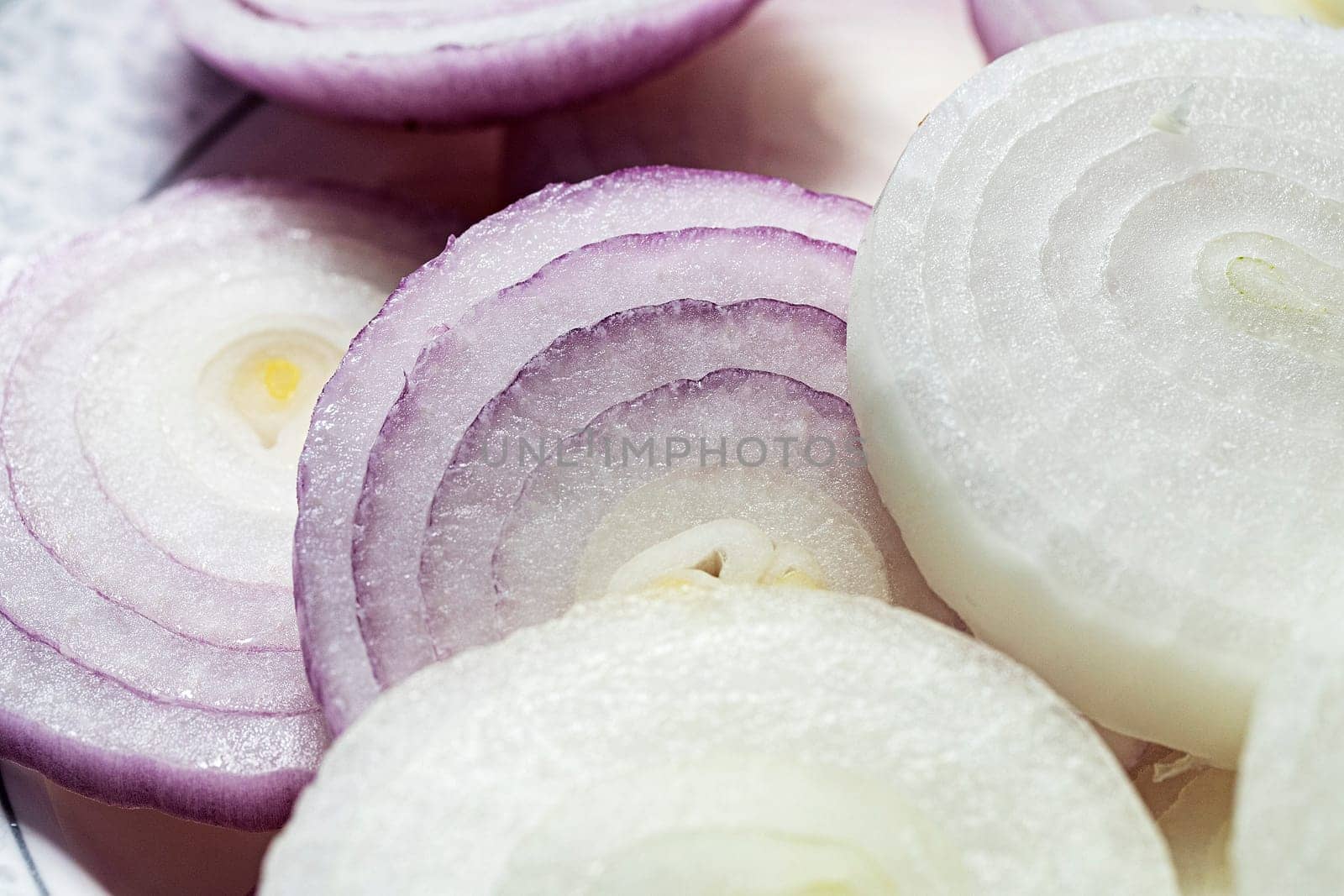peeled onion sliced raw white and purple vegetable fresh macro natural