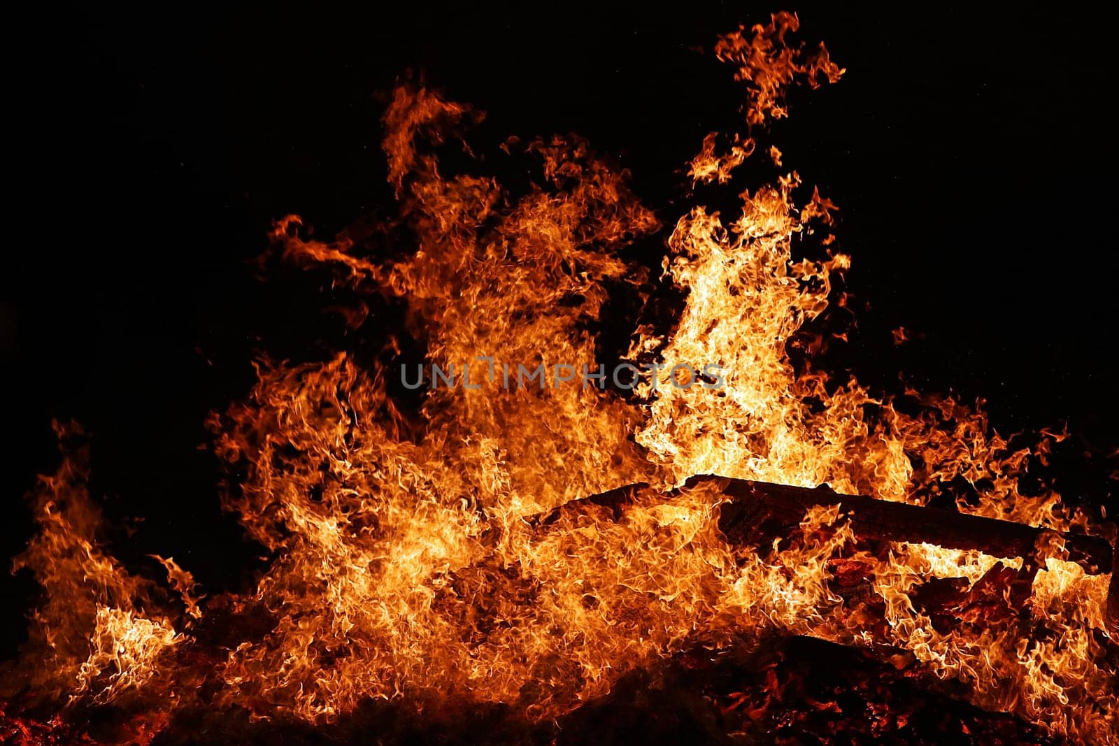 A big glowing fire with high flames