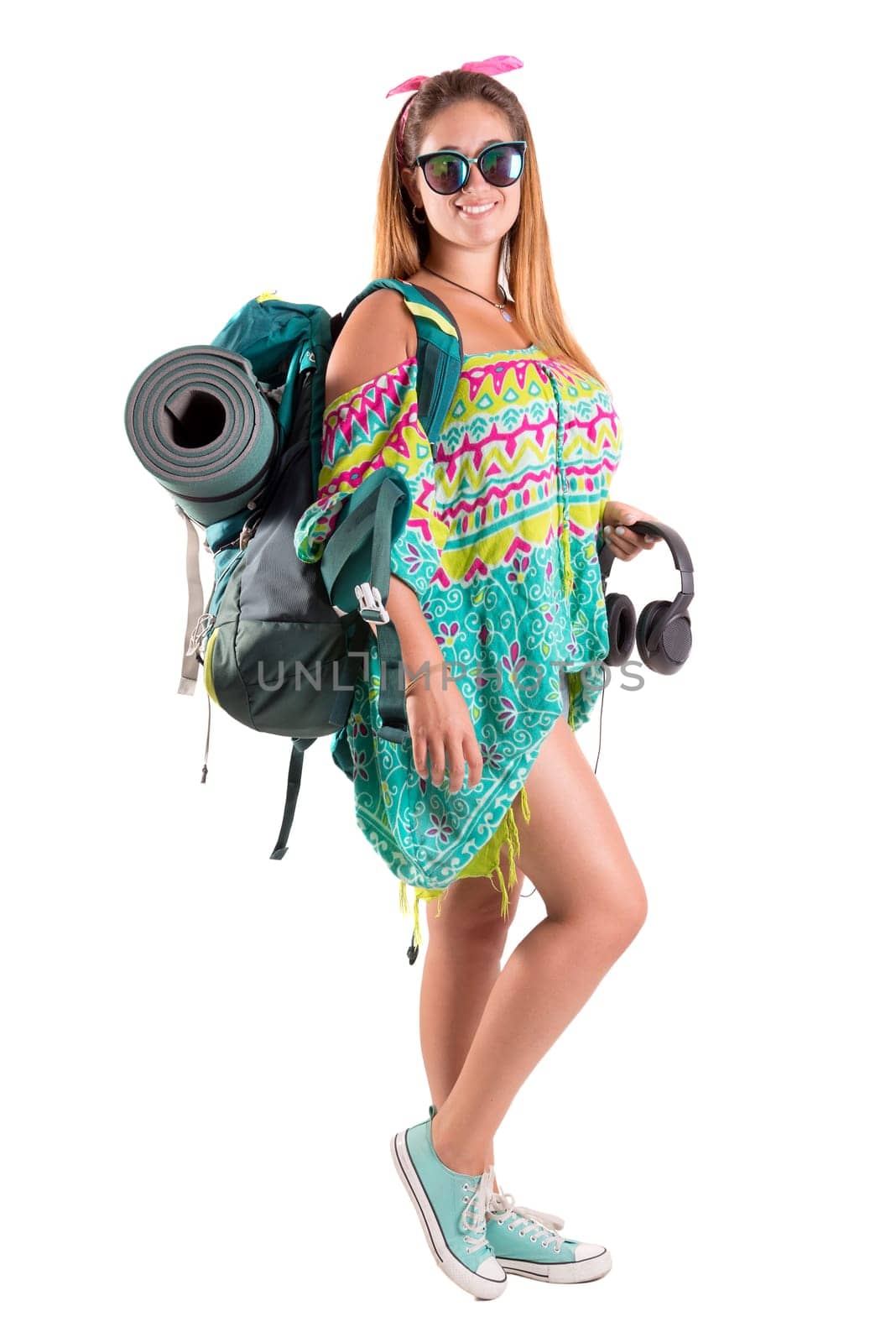 Happy hiker girl with backpack isolated in white, trekking and travel lifestyle concept