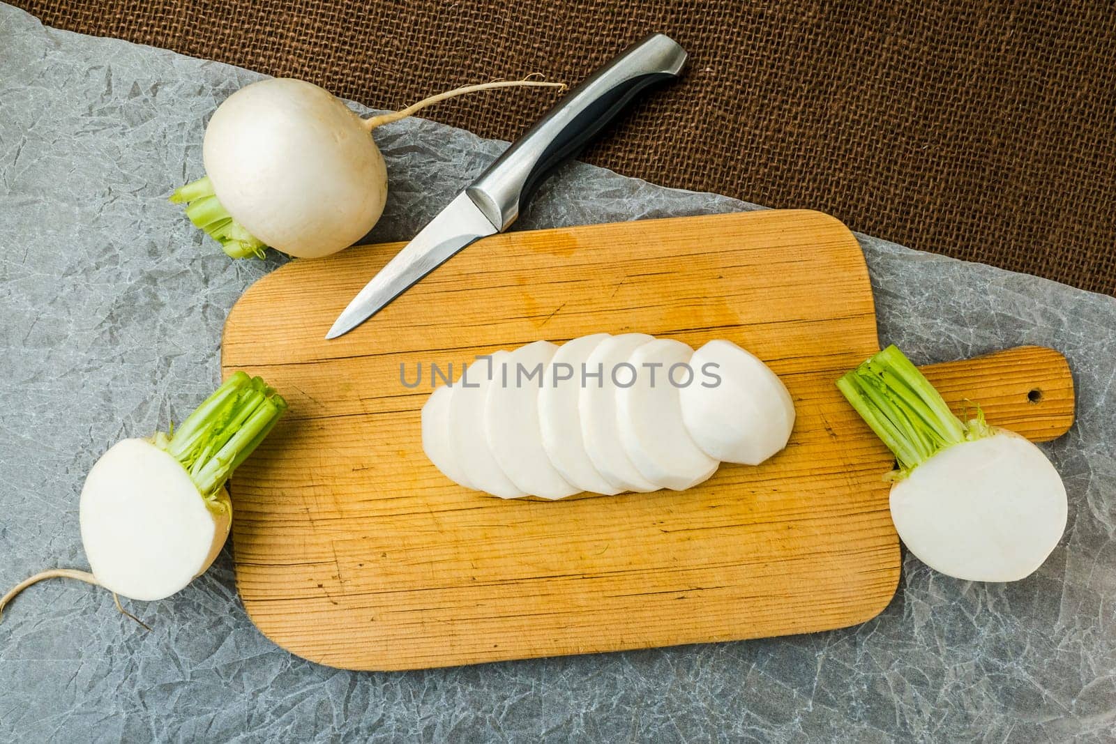 Sliced daikon radish.Tasty fresh crude white round japanese radish.