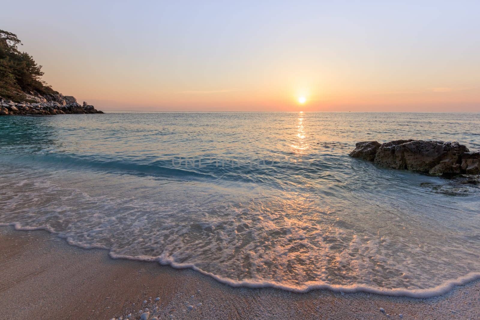 sunrise in Marble beach (Saliara beach), Thassos Islands, Greece. The most beautiful white beach in Greece