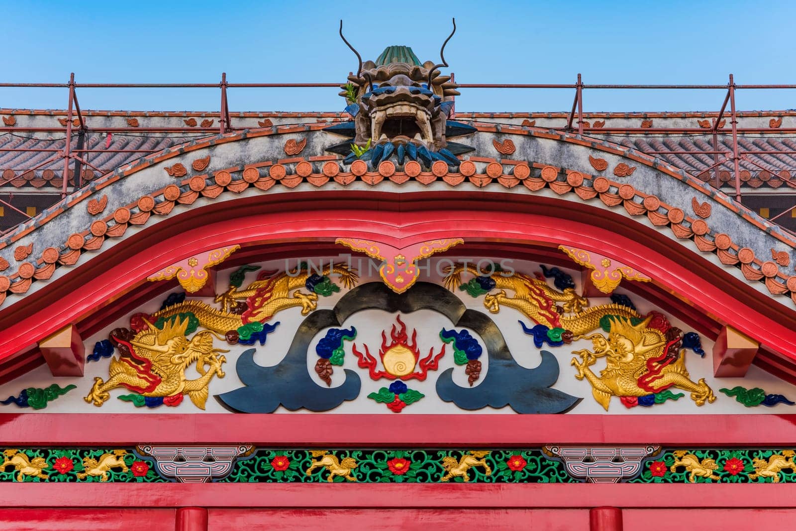 Shuri Castle's karahafu style red tiled roof decorated with dragons in the Shuri neighborhood of Naha, the capital of Okinawa Prefecture, Japan.
