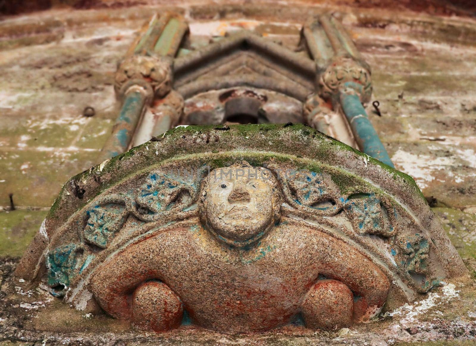 Plouha, France, August 15, 2019: Chapel of Kermaria an Iskuit - sculpture above the entrance to the Chapel of Kermaria an Iskuit from 13th century