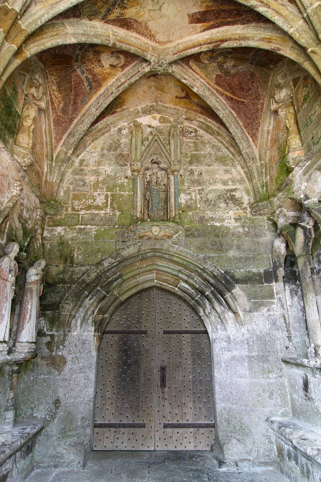 Gothic entrance to the Chapel of Kermaria an Iskuit from 13th century, Plouha, Brittany, France