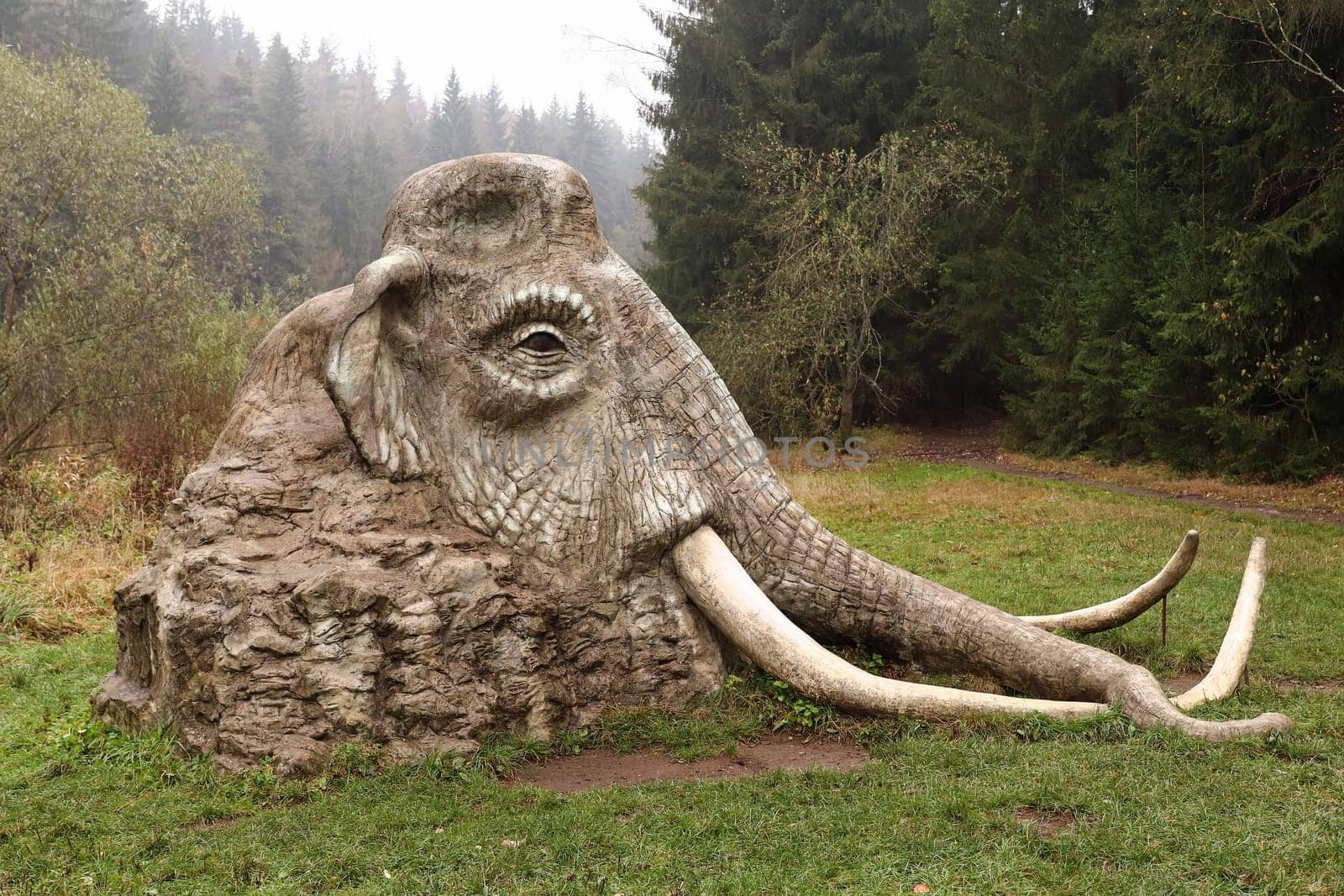 SAZAVA, CZECH REPUBLIC, November 2, 2019: Statue of mammoth in the landscape, author: Michal Olsiak, Zdar nad Sazavou district, Vysocina Region, Czech Republic