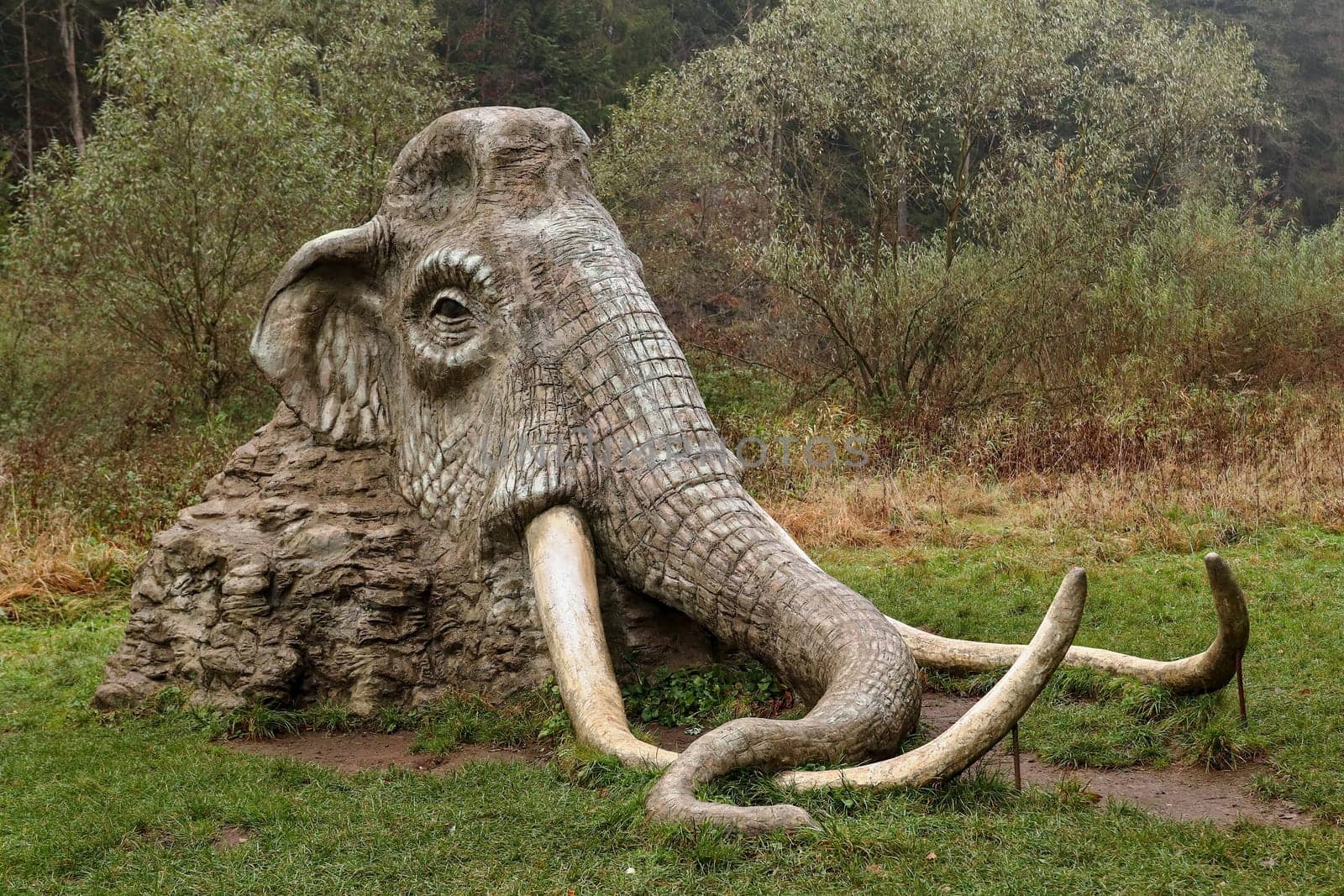 SAZAVA, CZECH REPUBLIC, November 2, 2019: Statue of mammoth in the landscape, author: Michal Olsiak, Zdar nad Sazavou district, Vysocina Region, Czech Republic