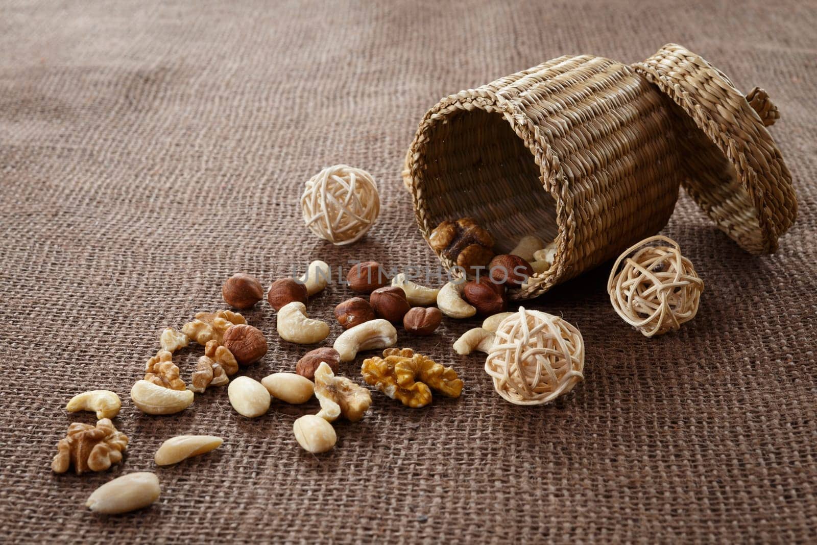 Almonds, cashew, walnuts and hazelnuts lying on burlap
