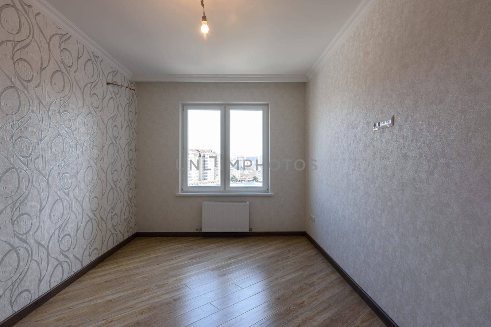 The interior of an empty room with new renovations