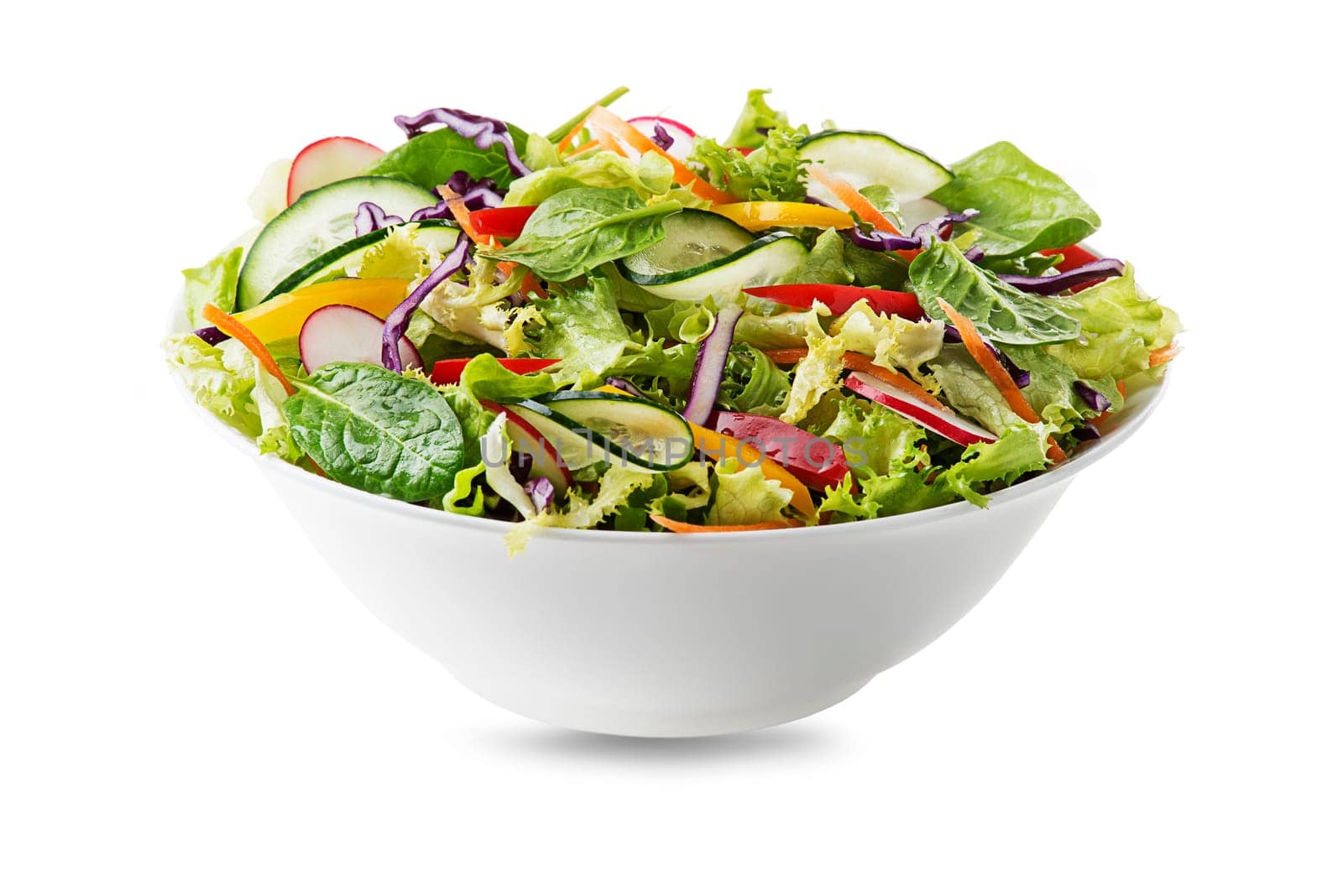 Green lettuce salad with fresh vegetables isolated on white background