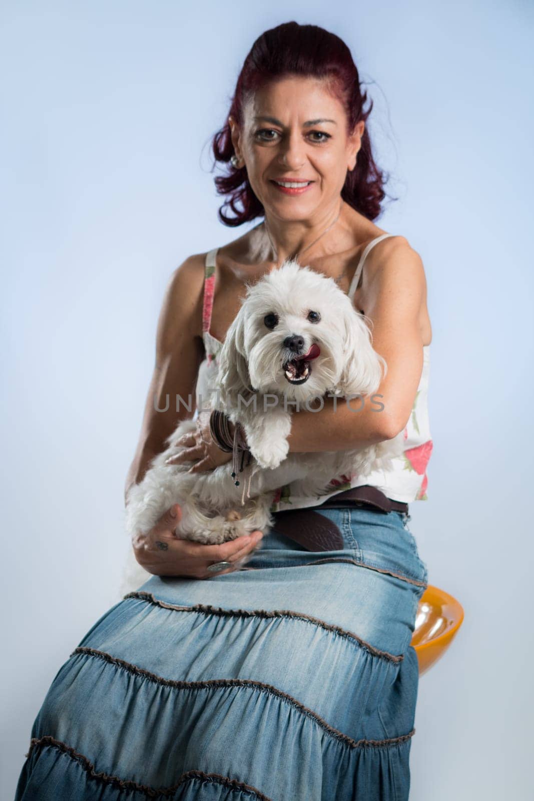 woman posing with her dog