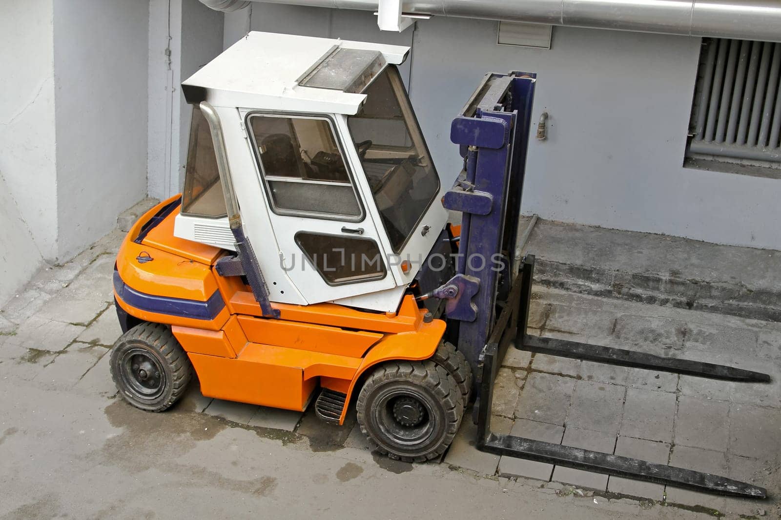 Industrial Forklift Commercial Vehicle in Distribution Warehouse