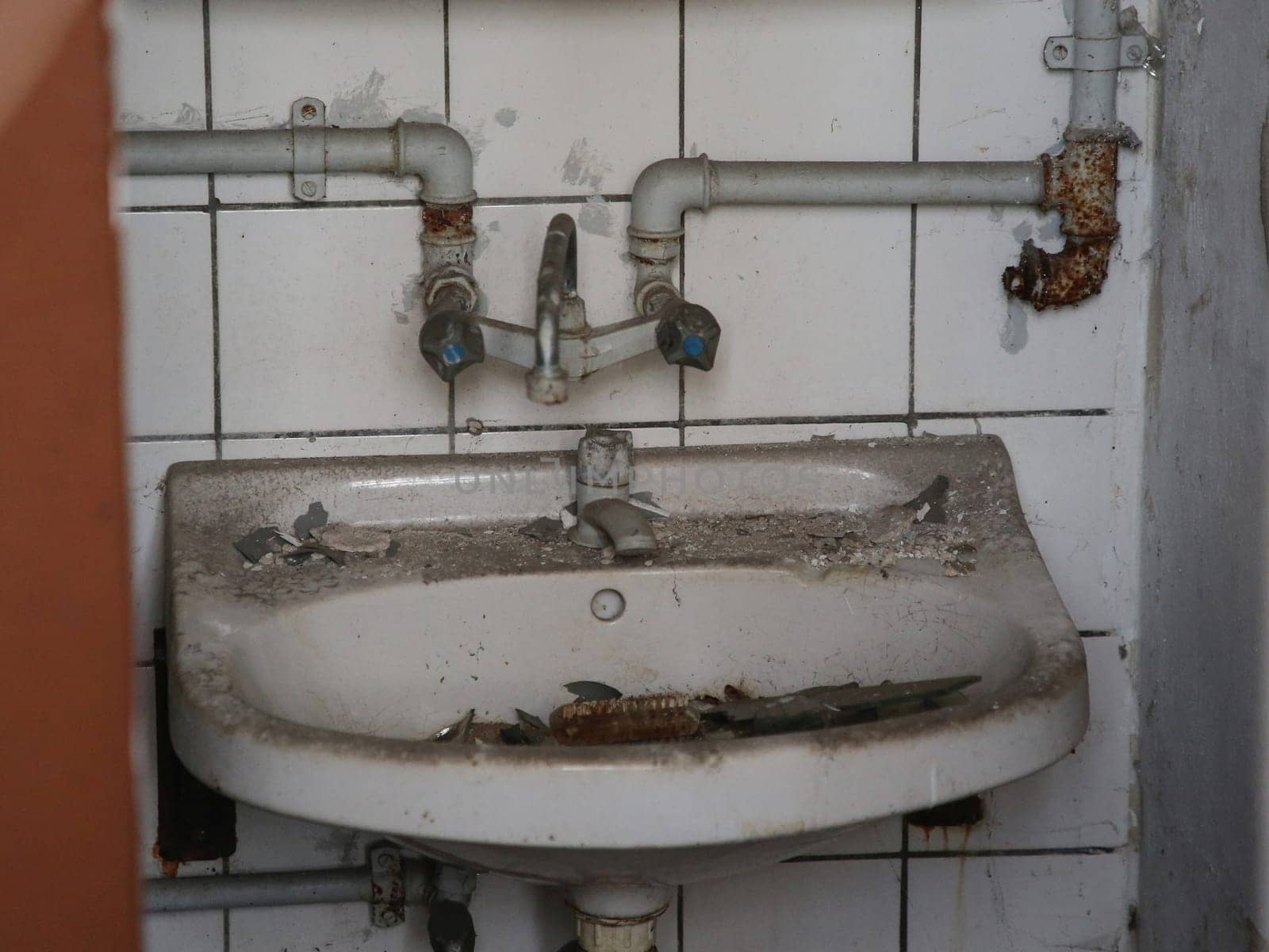 dirty sink with water connection