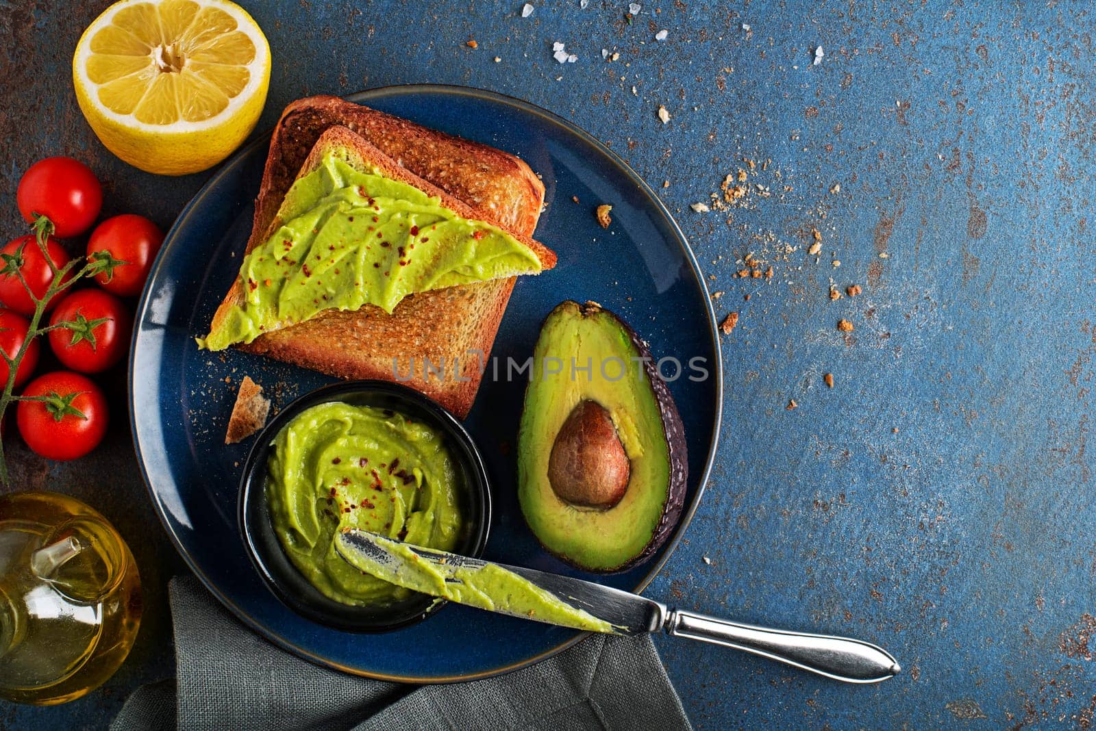 Delicious healthy meal with Avocado sandwich made with fresh sliced avocados. Concept for a tasty and healthy meal.