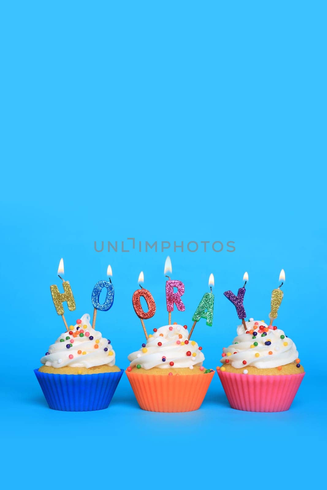 Happy Birthday Cupcakes With Candles That Say Hooray