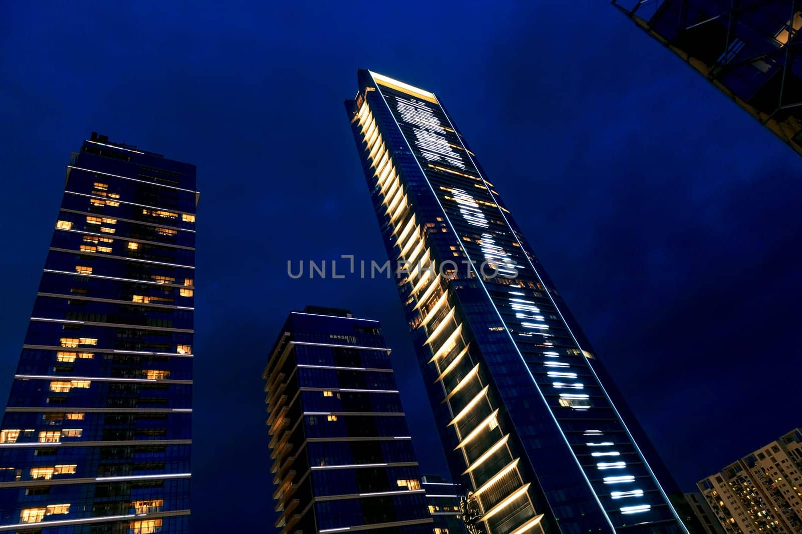 Night city with lights in the windows of skyscrapers, Shenzhen, China, Asia