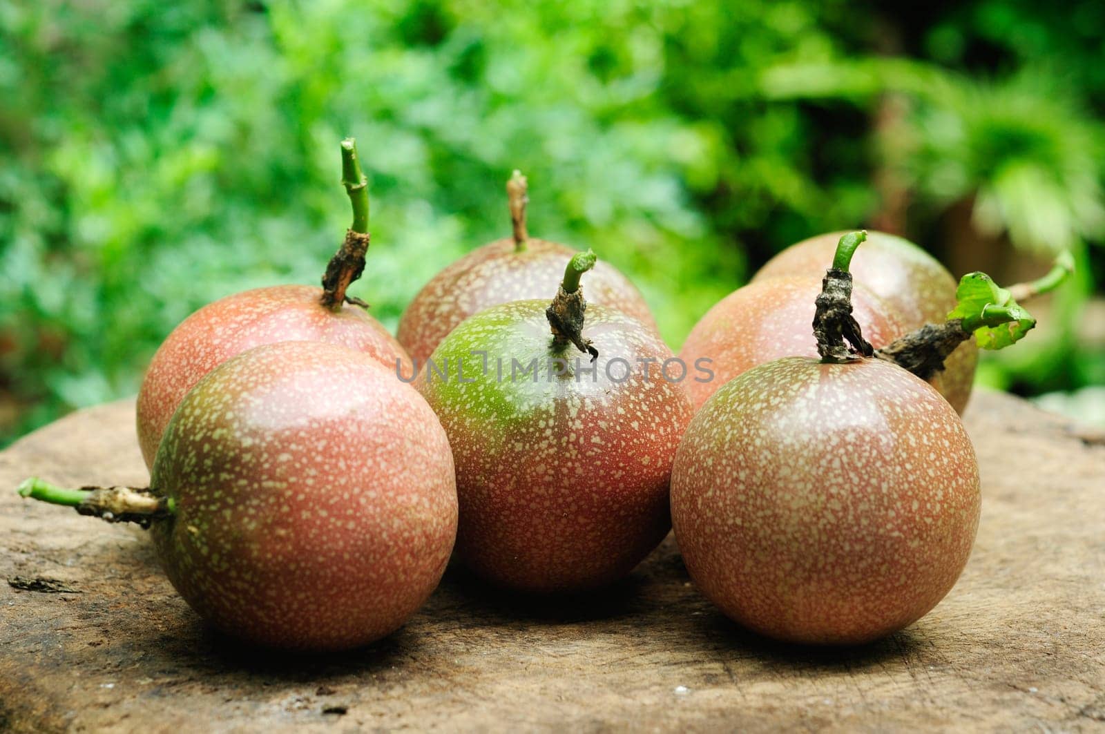Passion fruit on wooden table.