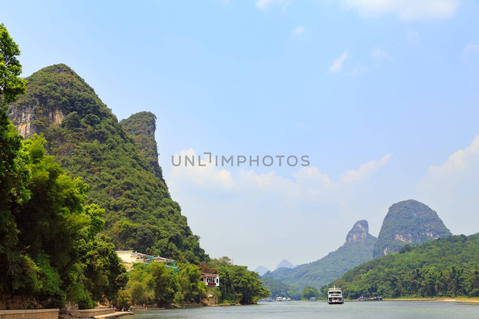 Great view of the mountains and the river on a clear sunny day, Yangshuo, China, Asia