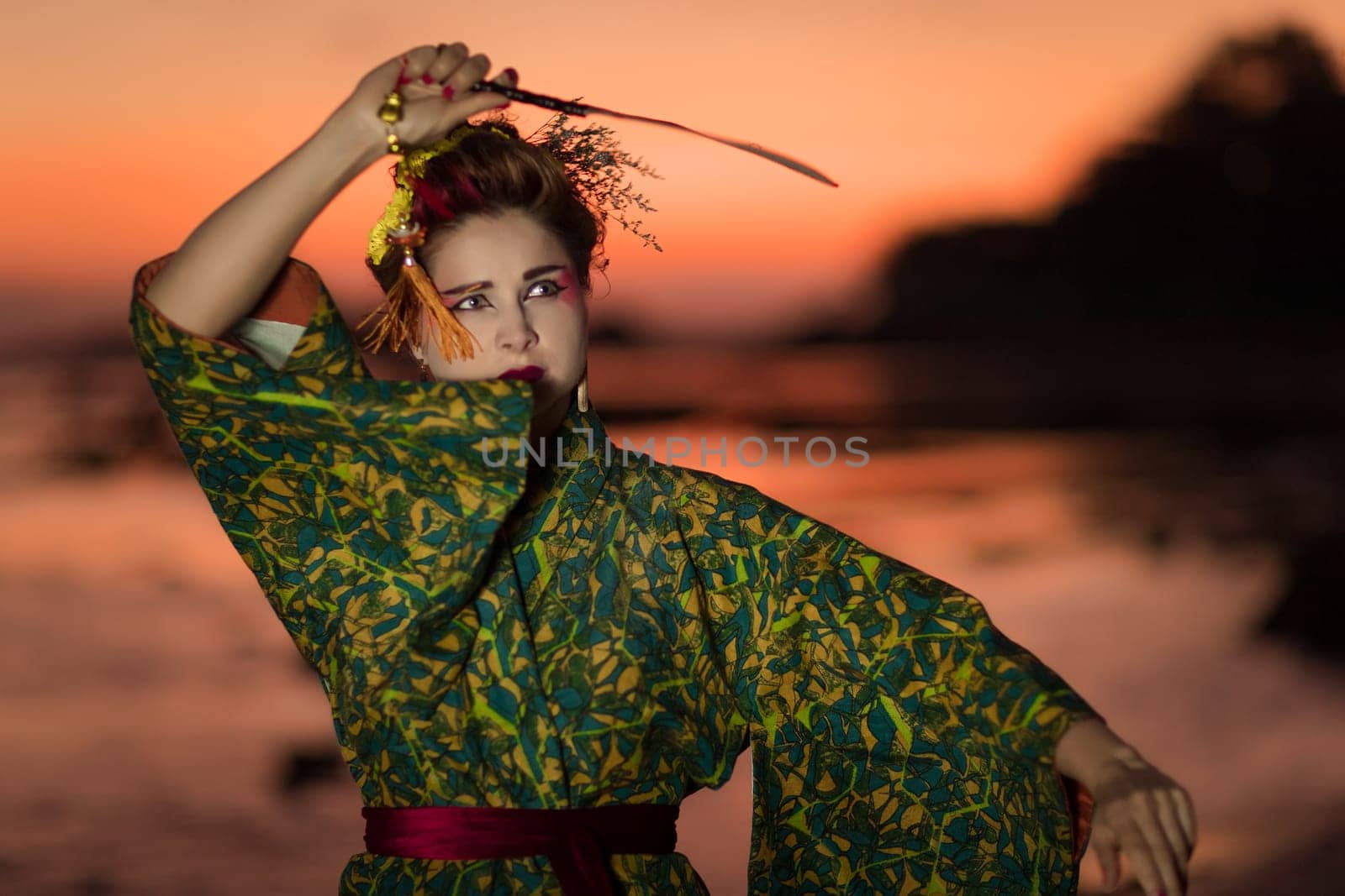 Fine art portrait of european woman in Japanese Geisha style wearing kimono