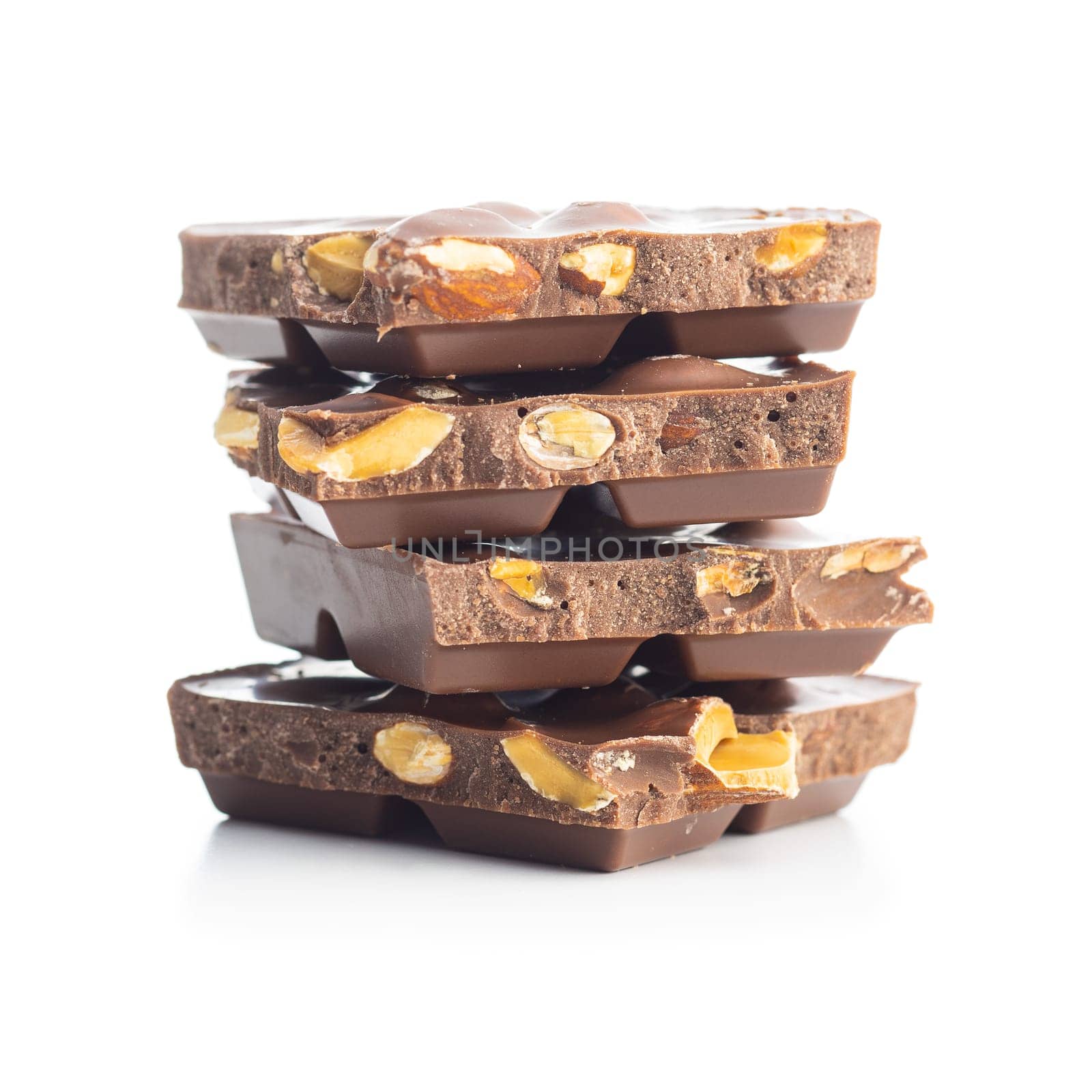 Chocolate bar with hazelnuts isolated on white background.