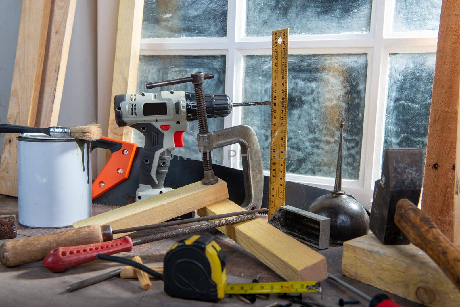 some tools of carpenter in the workshop, near the window