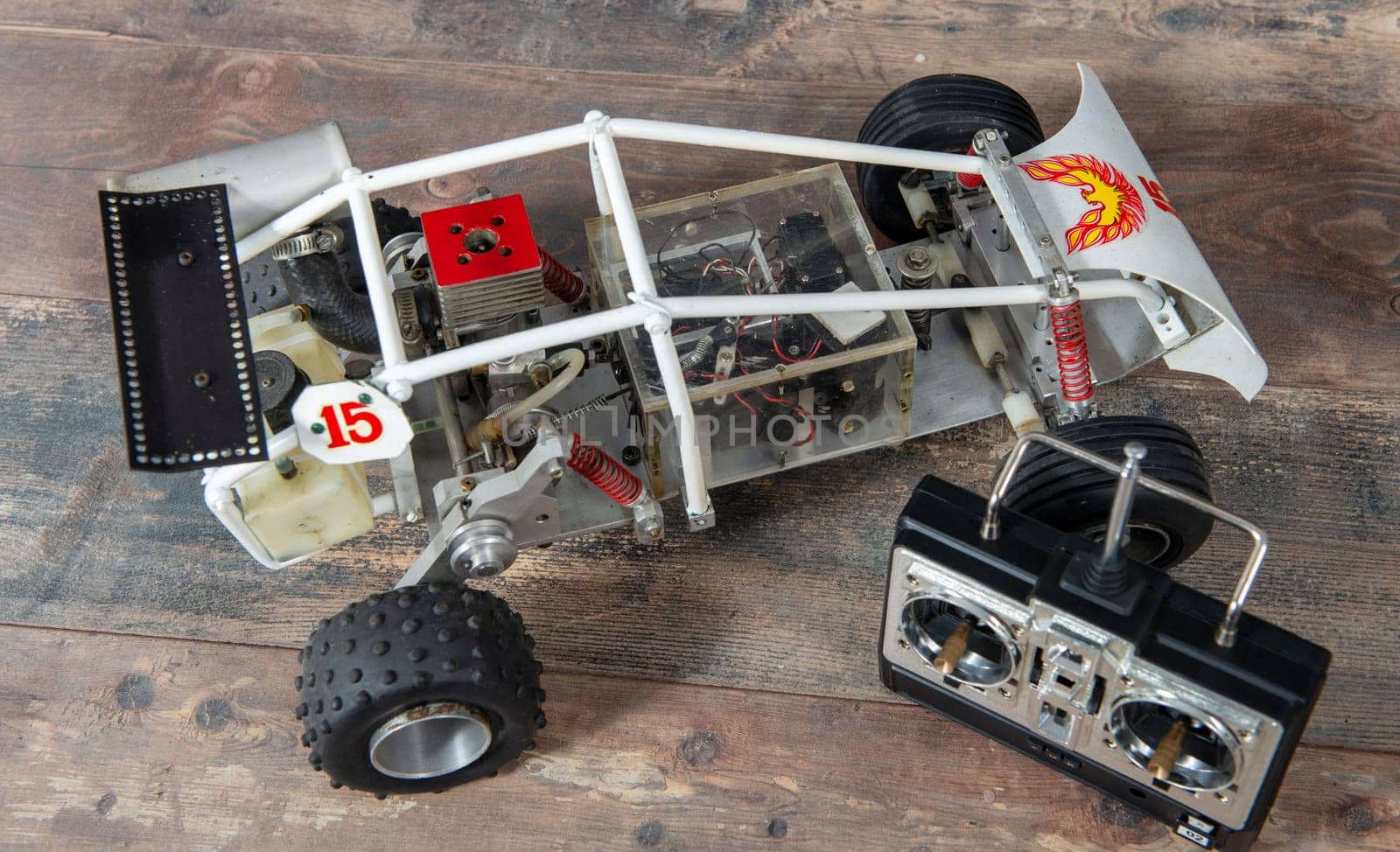 RC buggy models and a control panel.