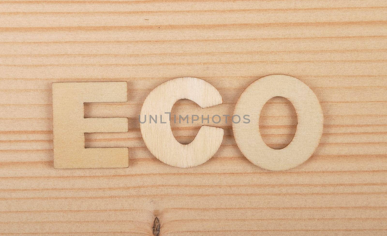 Term from wooden letters on pale wood