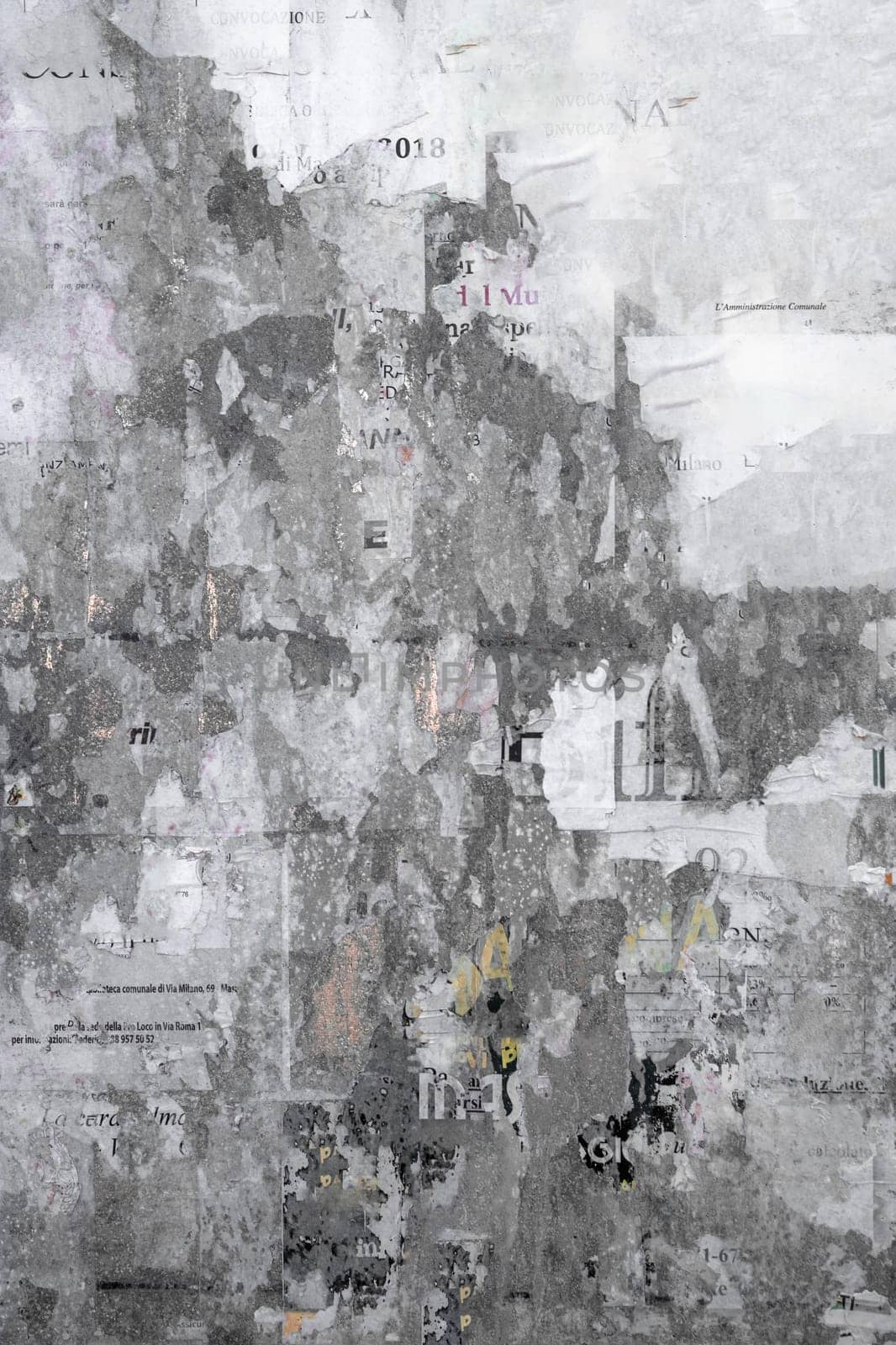 Grunge Background with Old Torn Posters. It can be used as background and texture.