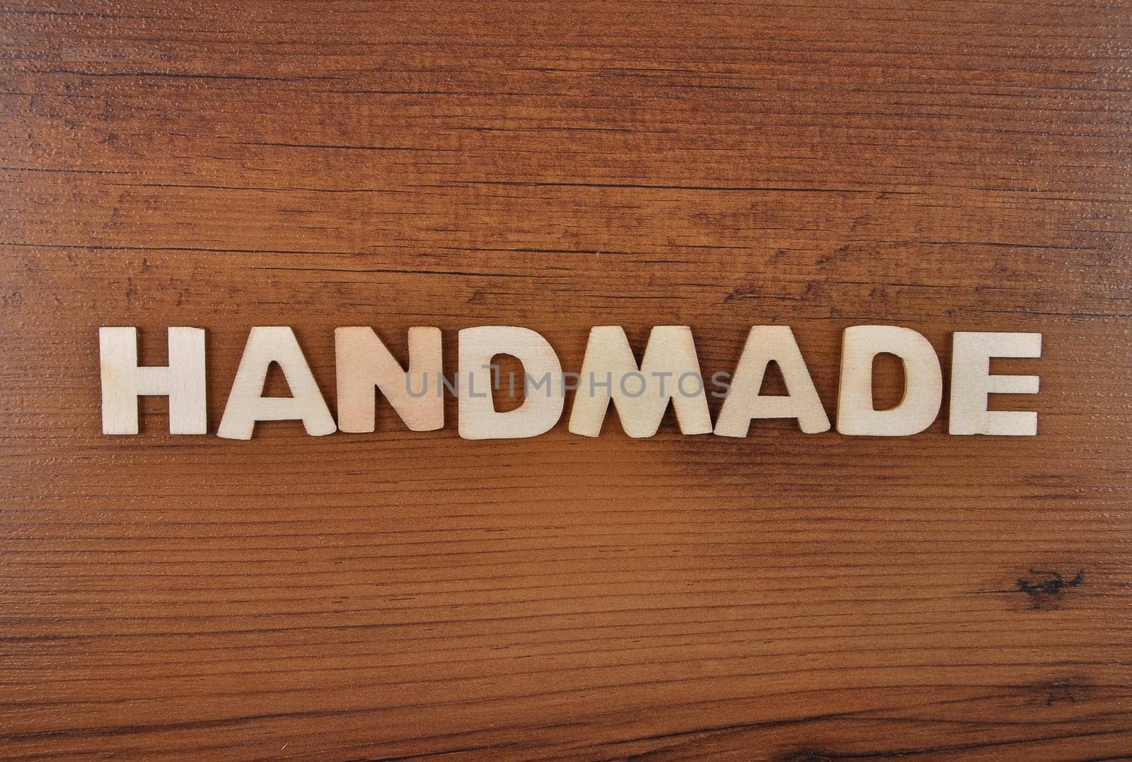 Term from wooden letters on old wooden board