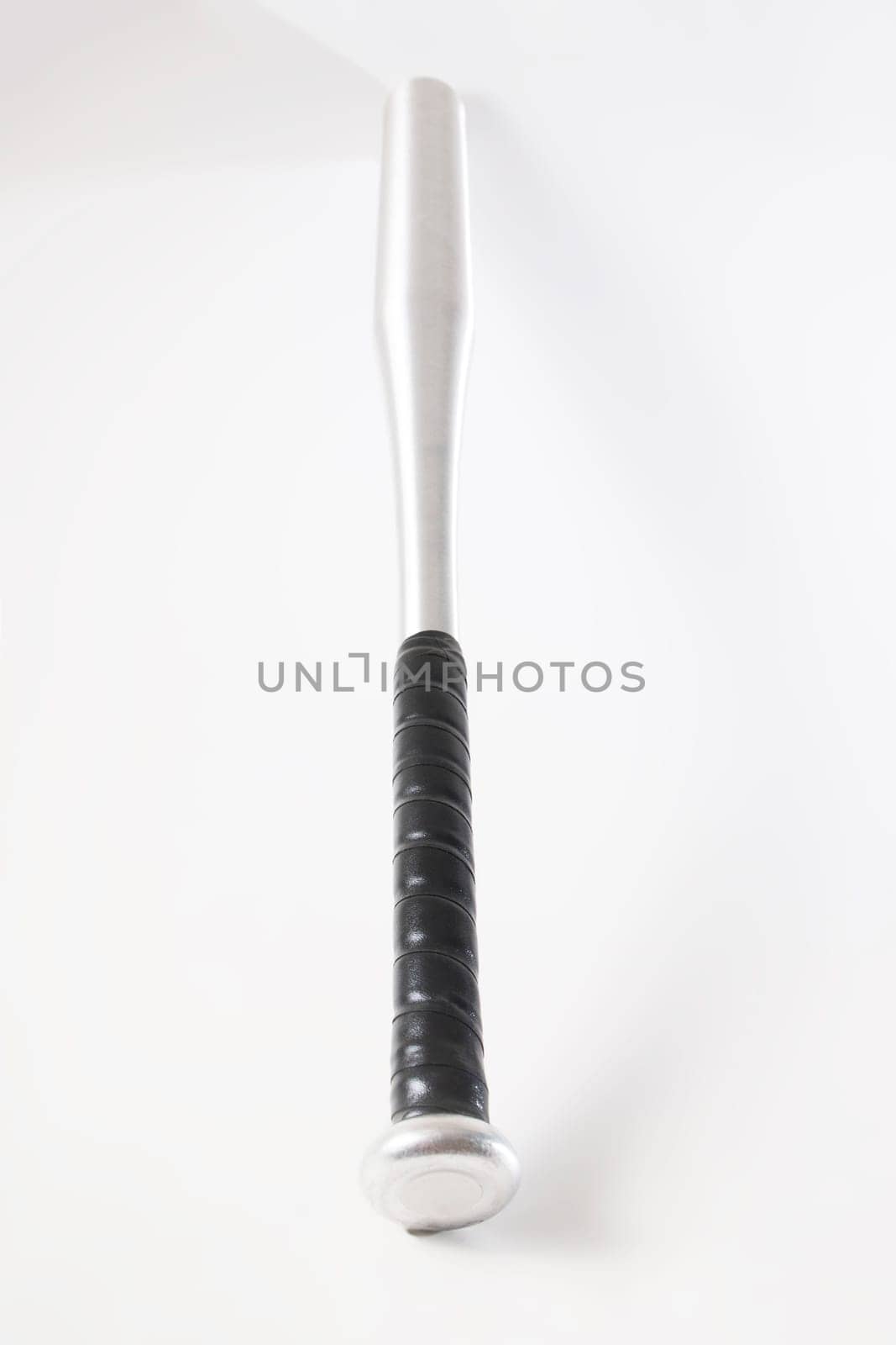 Aluminum baseball bat isolated on a white background.