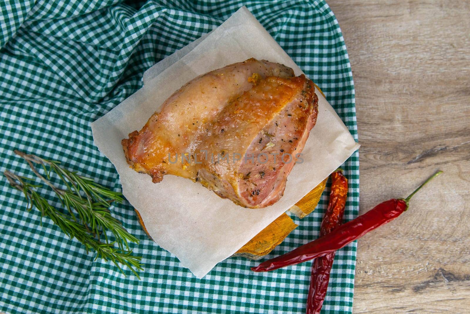 Whole roasted chicken rosemary and chilli. Baked chicken grilled barbecue delicious food on dining table at holiday celebrate.