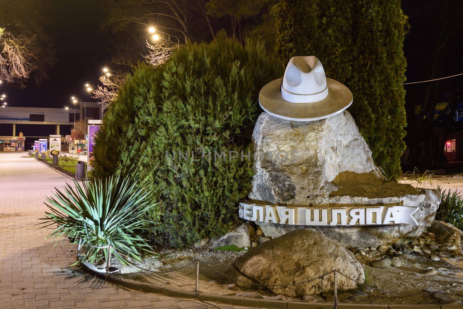 Anapa, Russia - February 28, 2020: Sculpture "White hat"" in the city of Anapa, view after sunset"