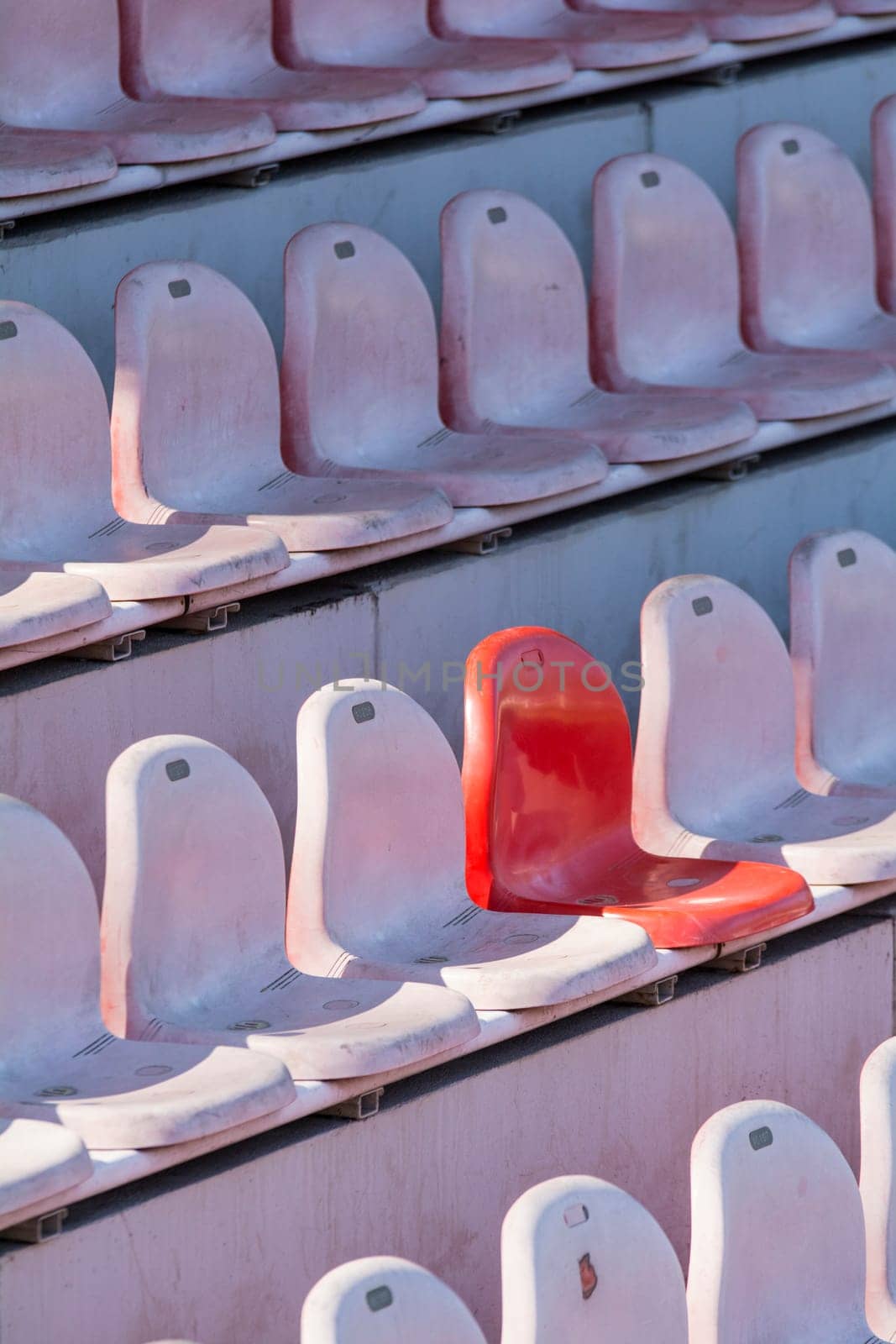 empty arena with plastic seats